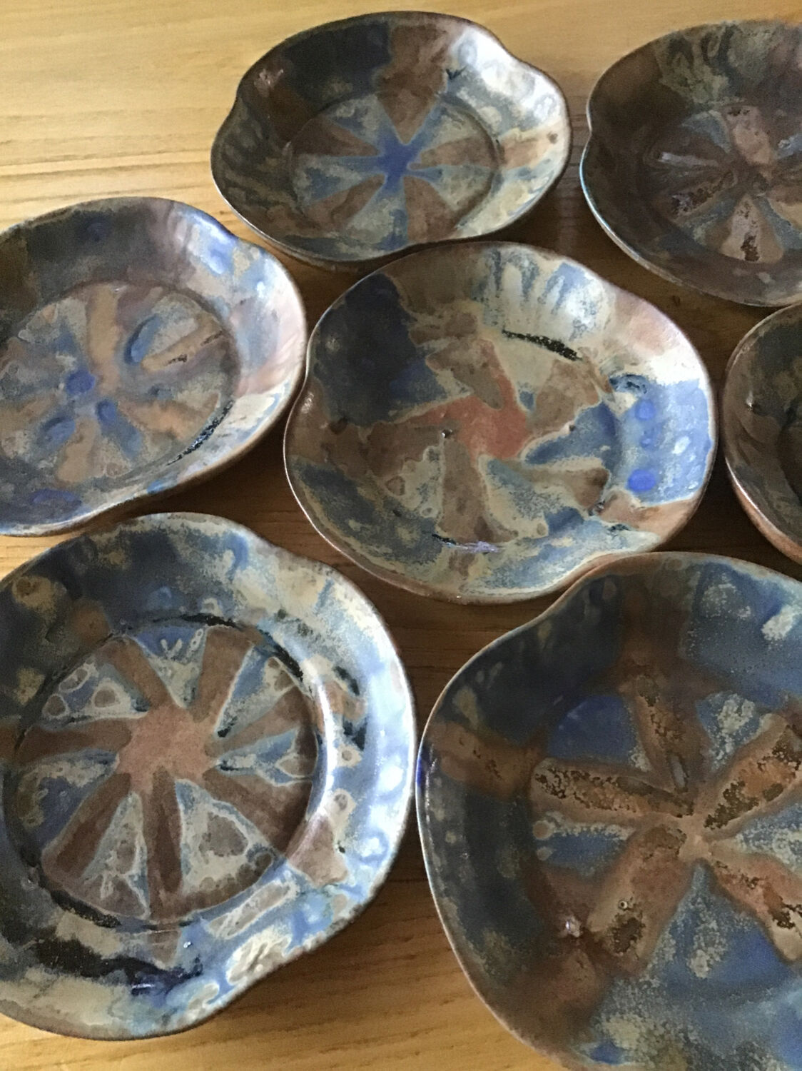 7 stoneware cups signed G Méténier