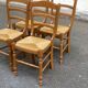 4 solid wood and straw Louis Philippe chairs from the 1960s.