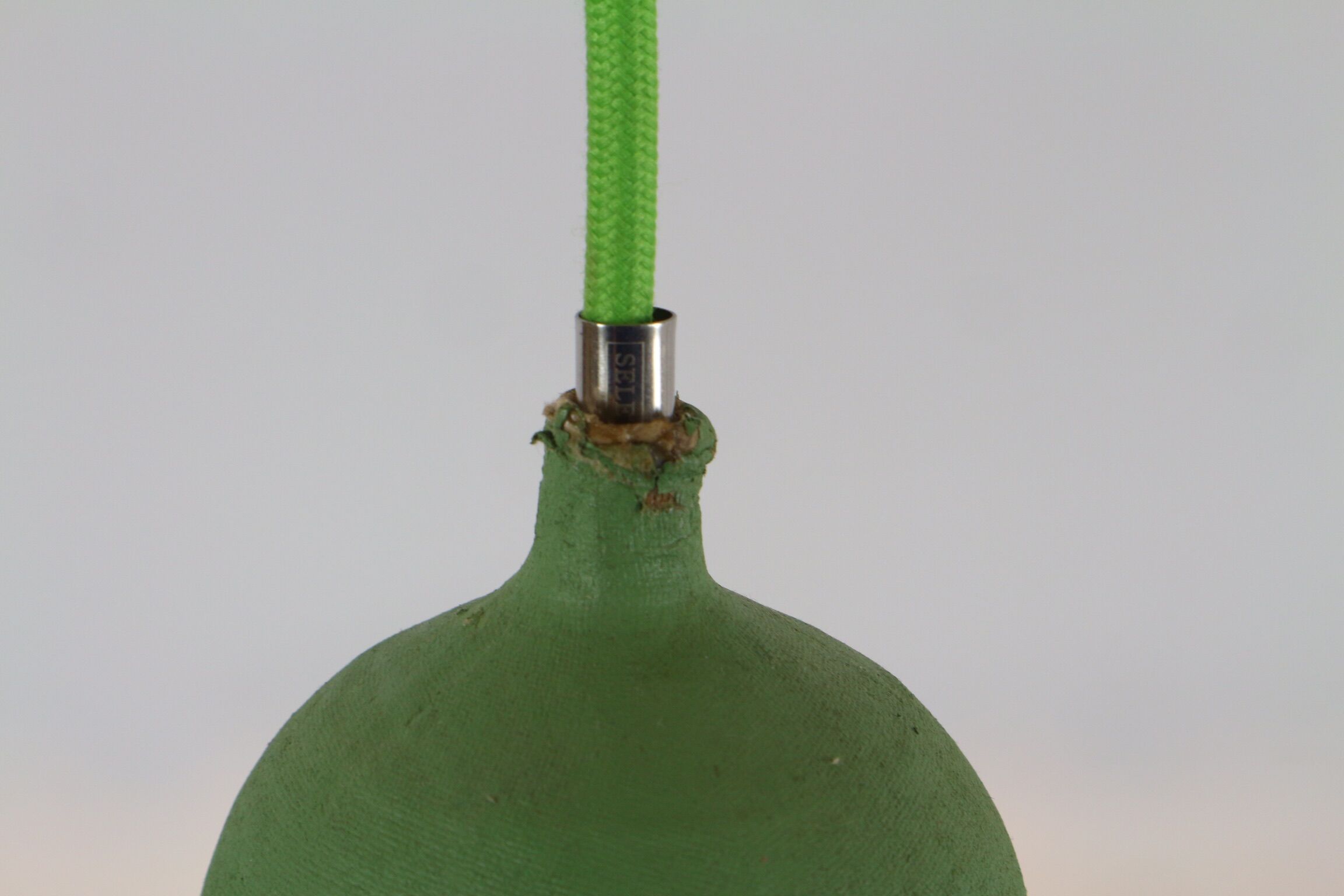 Two lamps/ pendant lamps in recycled cardboard, pink and green, seletti