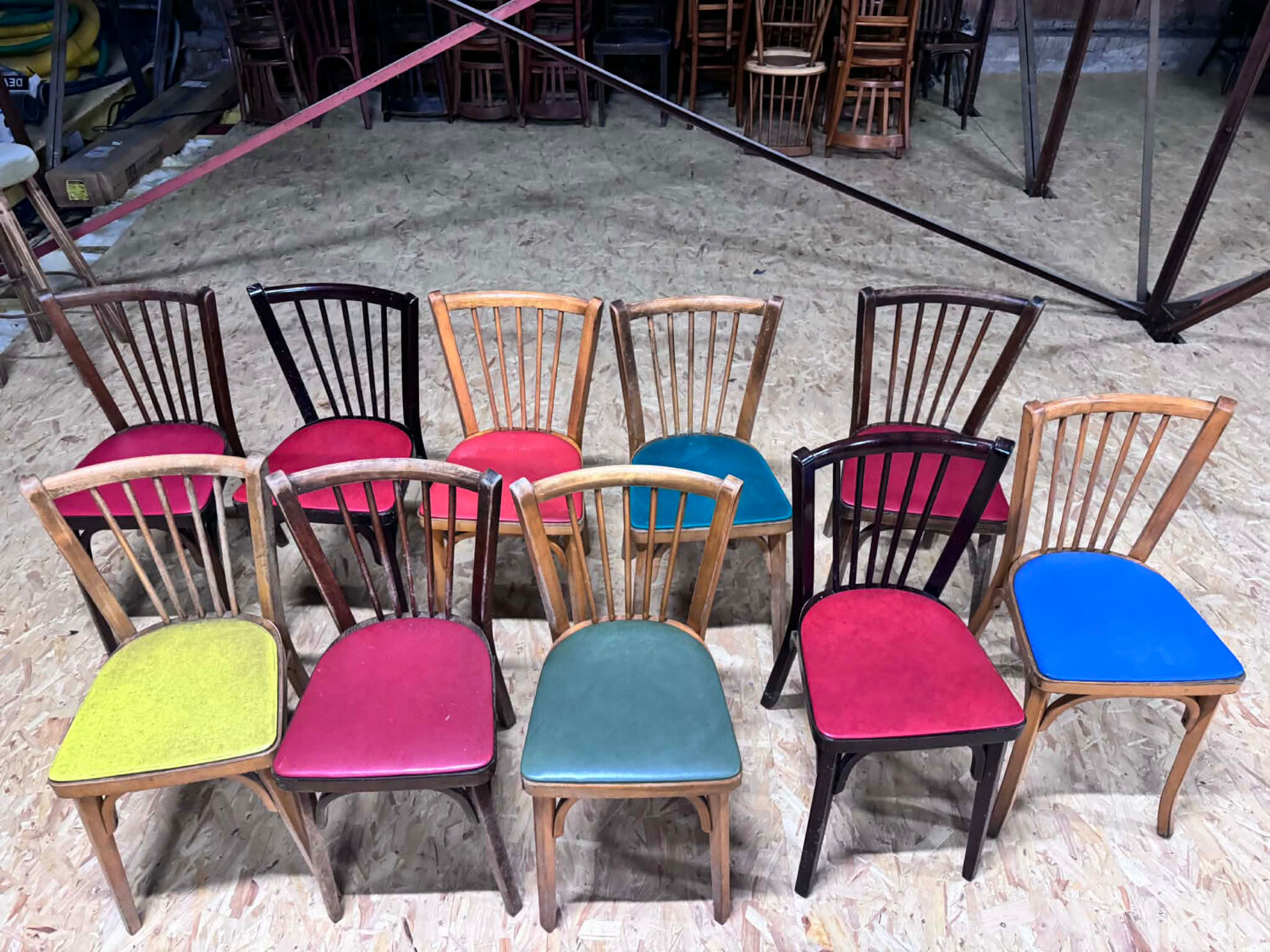 Set of 10 Baumann bistro chairs with curved wood and Skaï seat.