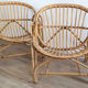 Duo de fauteuils coquille en rotin 1970
