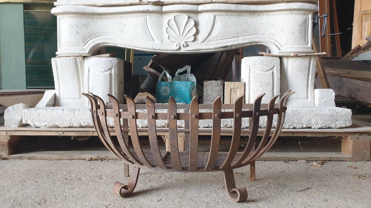 Wrought iron log holder in the shape of a semicircle - 20th century