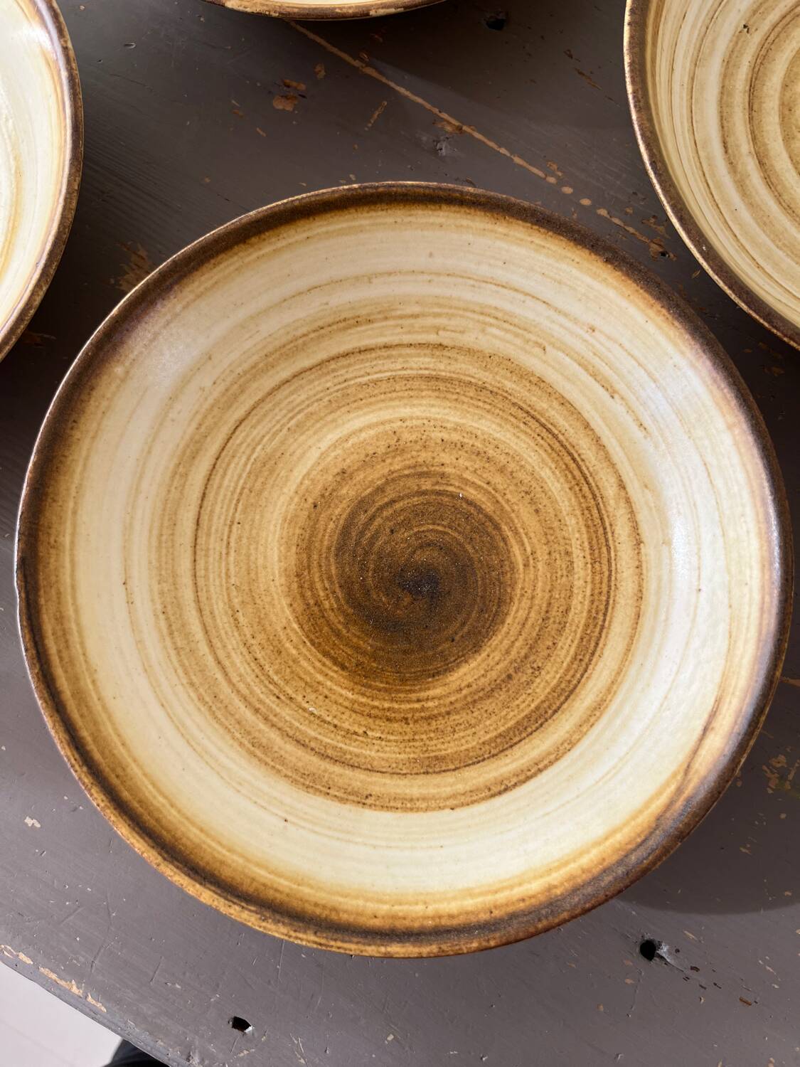 Lot de 4 assiettes creuses signées Longchamp