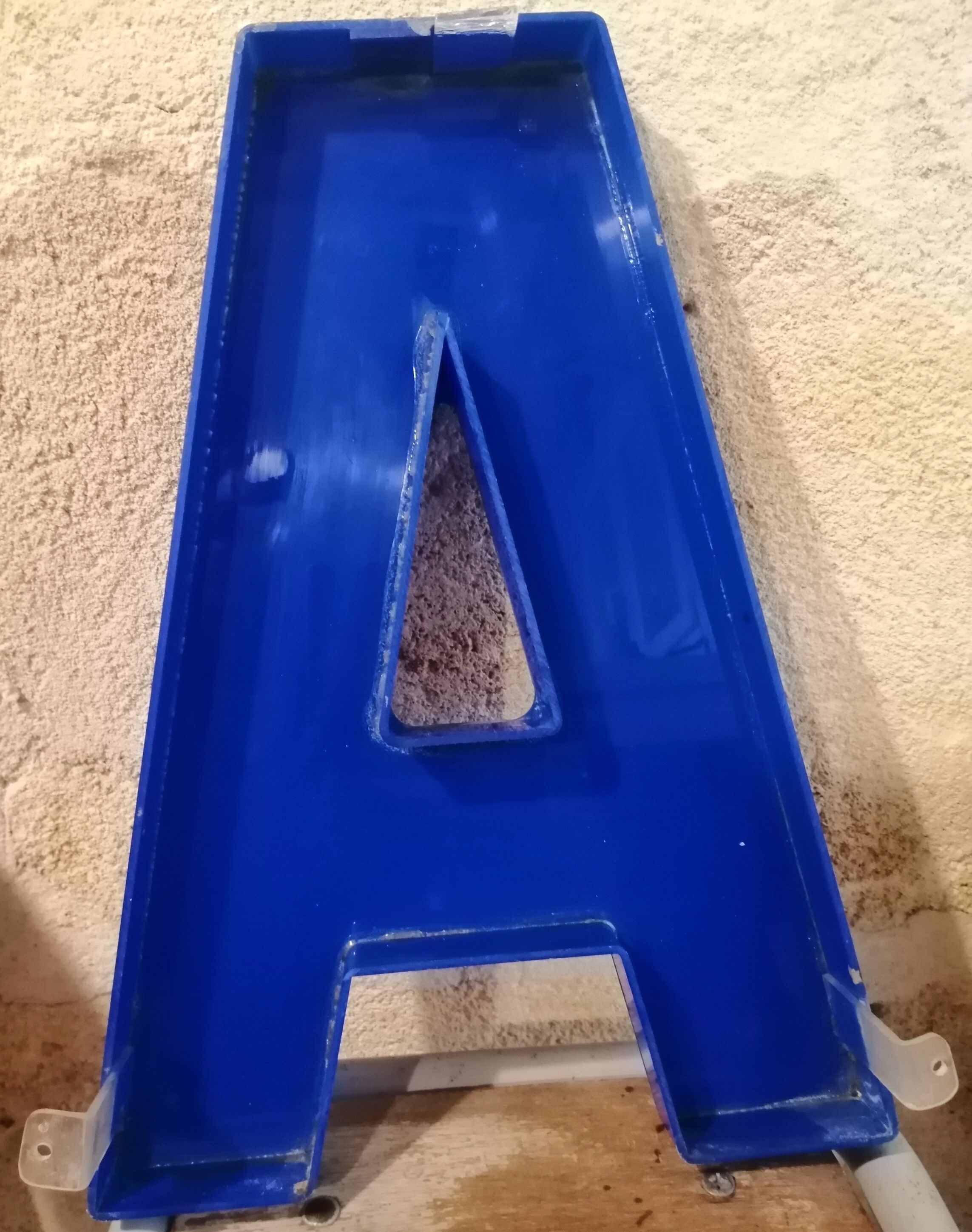 Letter A sign in vintage blue plexiglass