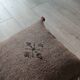 Moroccan brown cushion with cotton pompom