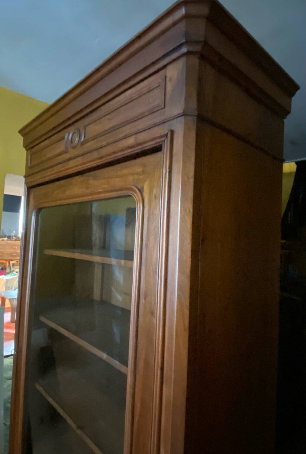 Walnut display cabinet with drawer