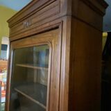 Walnut display cabinet with drawer