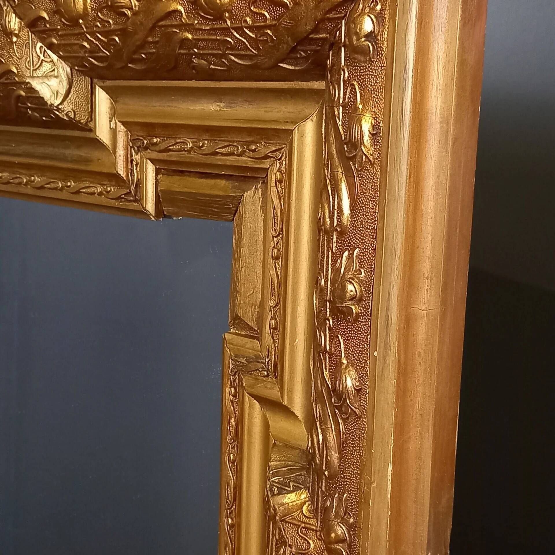 Antique French Napoleon III mirror with gold-coloured frame