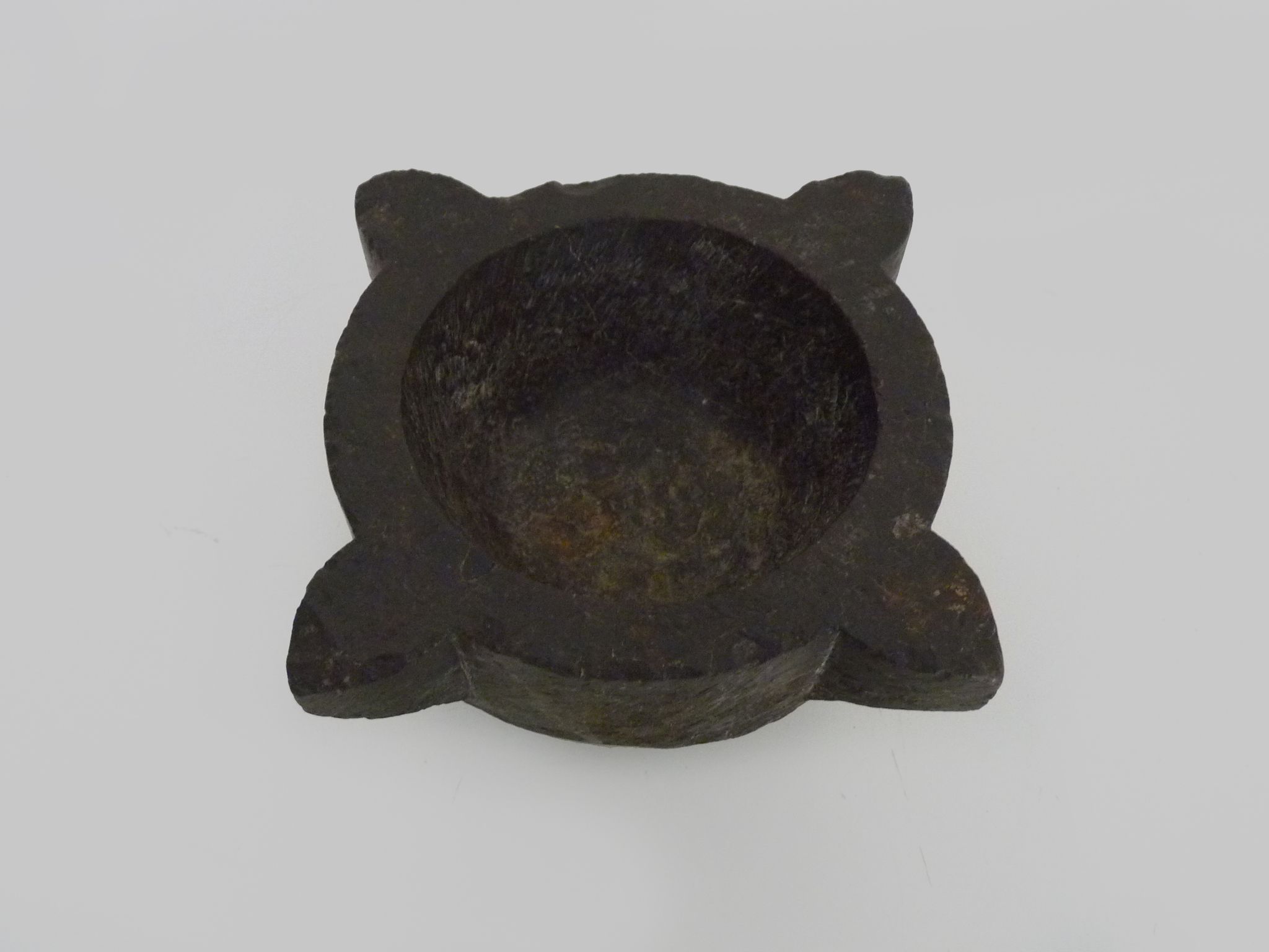 Old black marble apothecary mortar