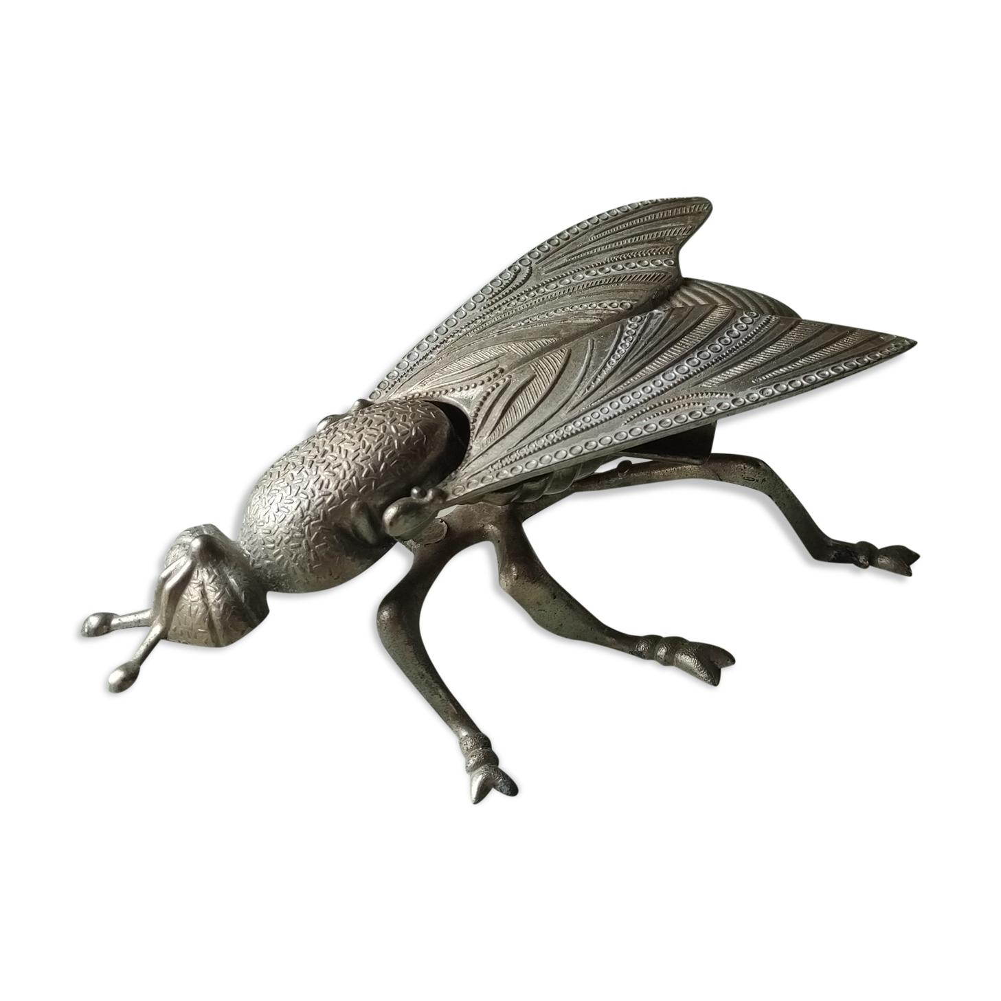Vintage metal fly, old ashtray to divert