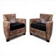 Pair of Roche Bobois armchairs with floral patterns.