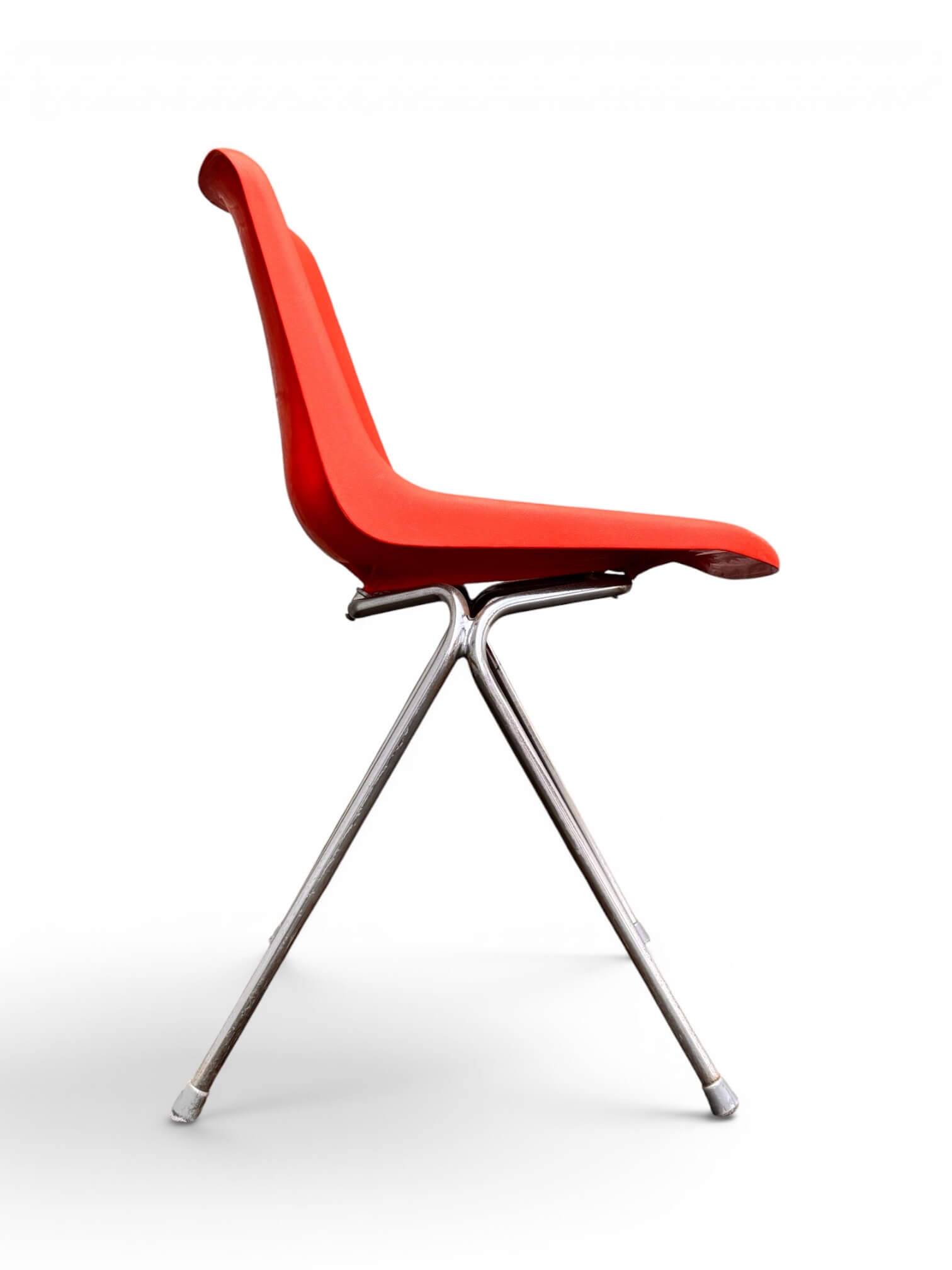 Set of 4 orange chairs designed by Robin Day for Hille.