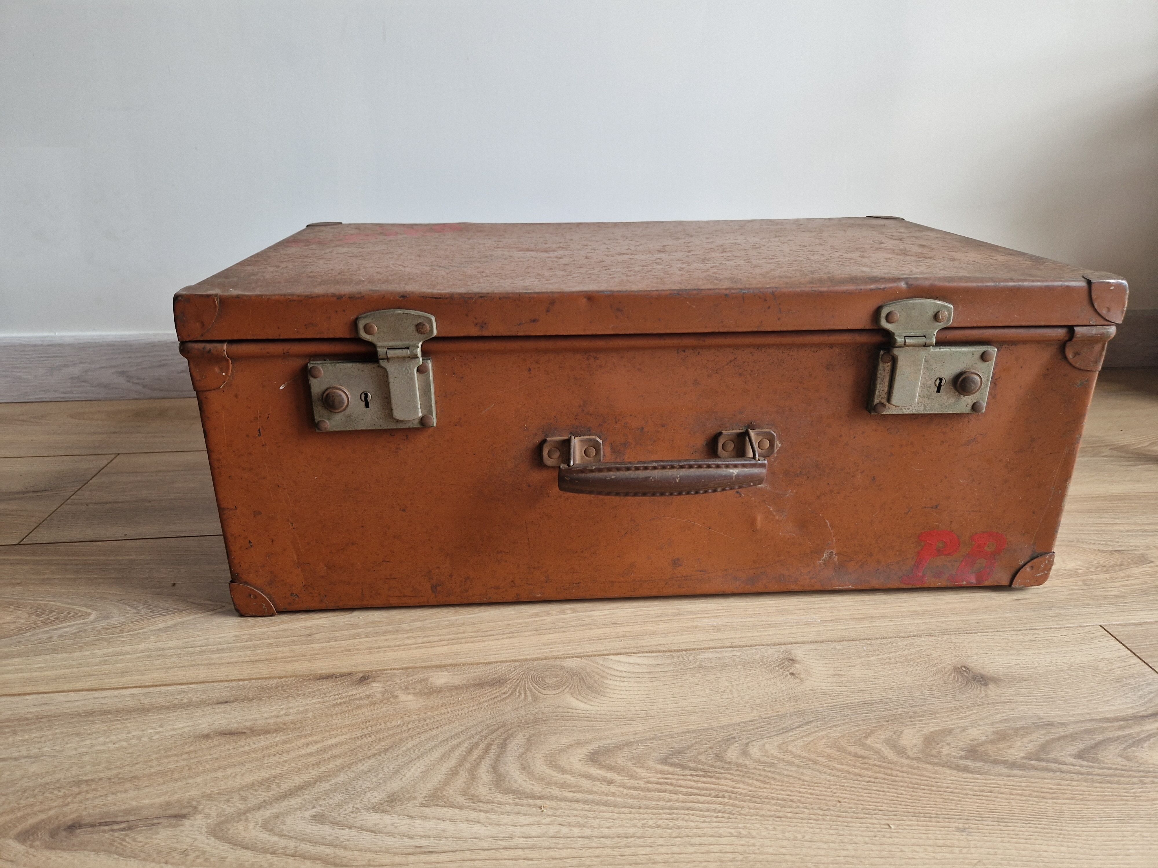 Old vintage military trunk orange metal