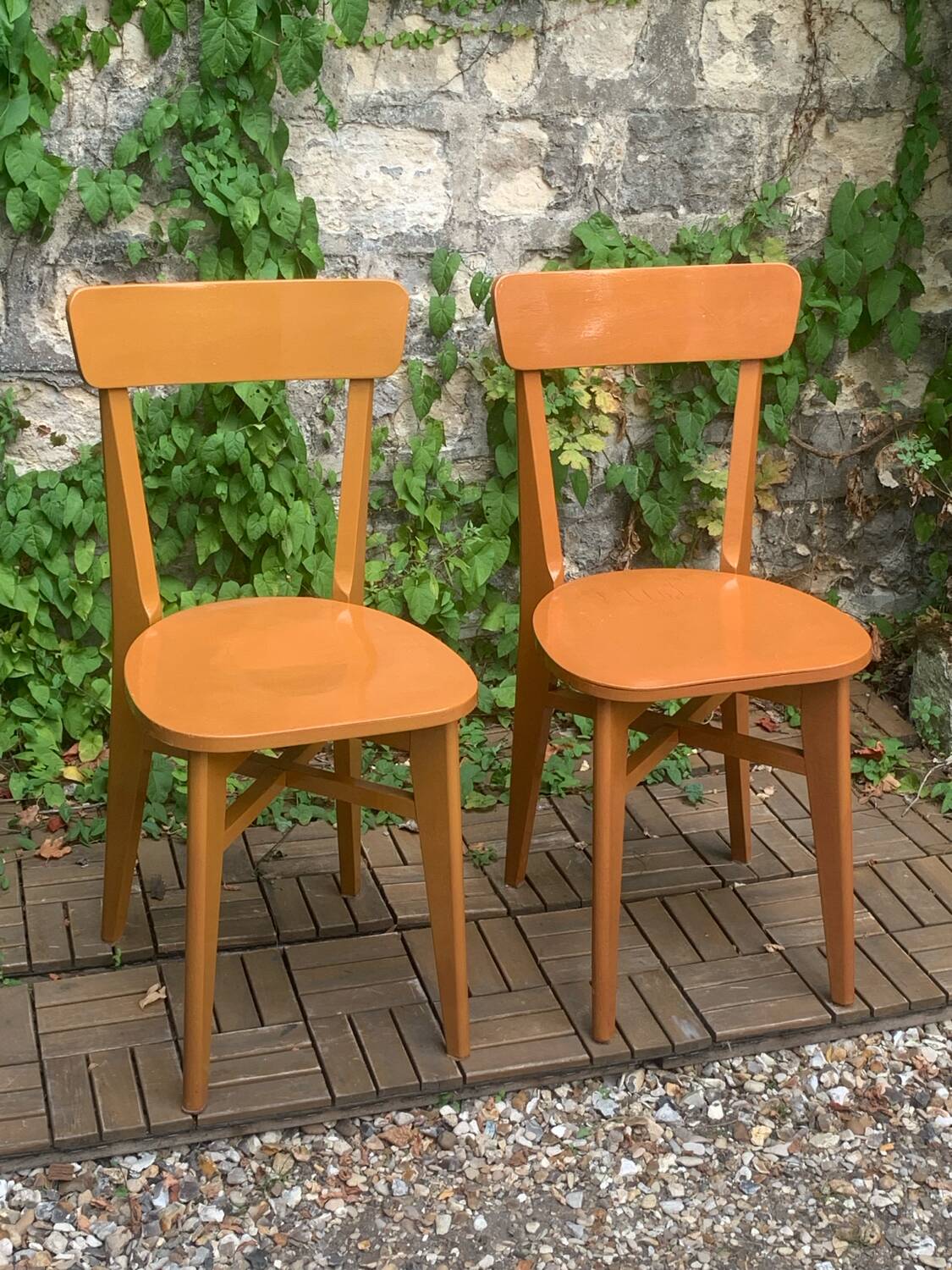 Pair of caramel bistro chairs 1950
