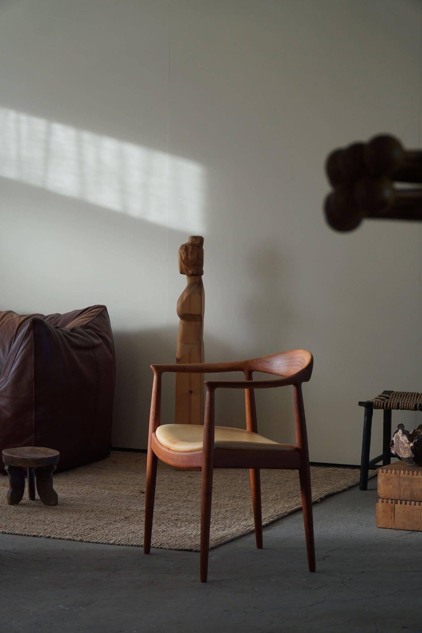 Hans J. Wegner, Teak and leather armchair, model "The Chair" JH501, 1950s