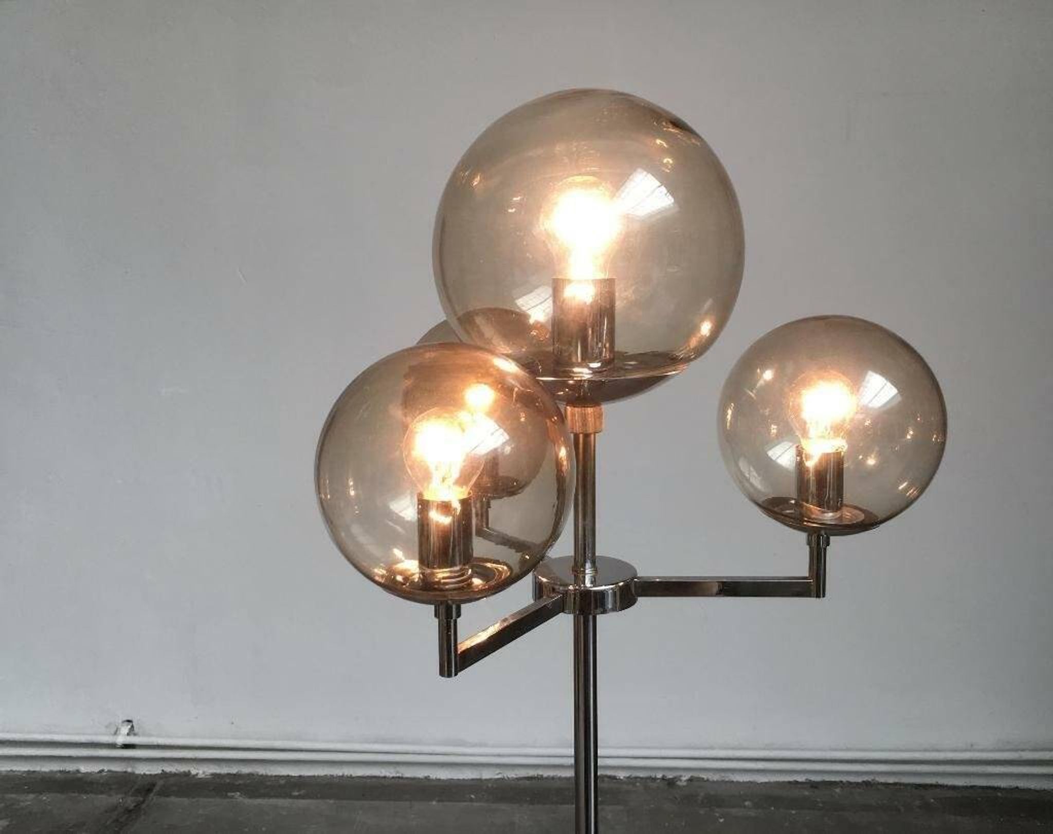 Chrome and glass floor lamp in mid-century German space style by Hustadt Leuchten, 1960s.