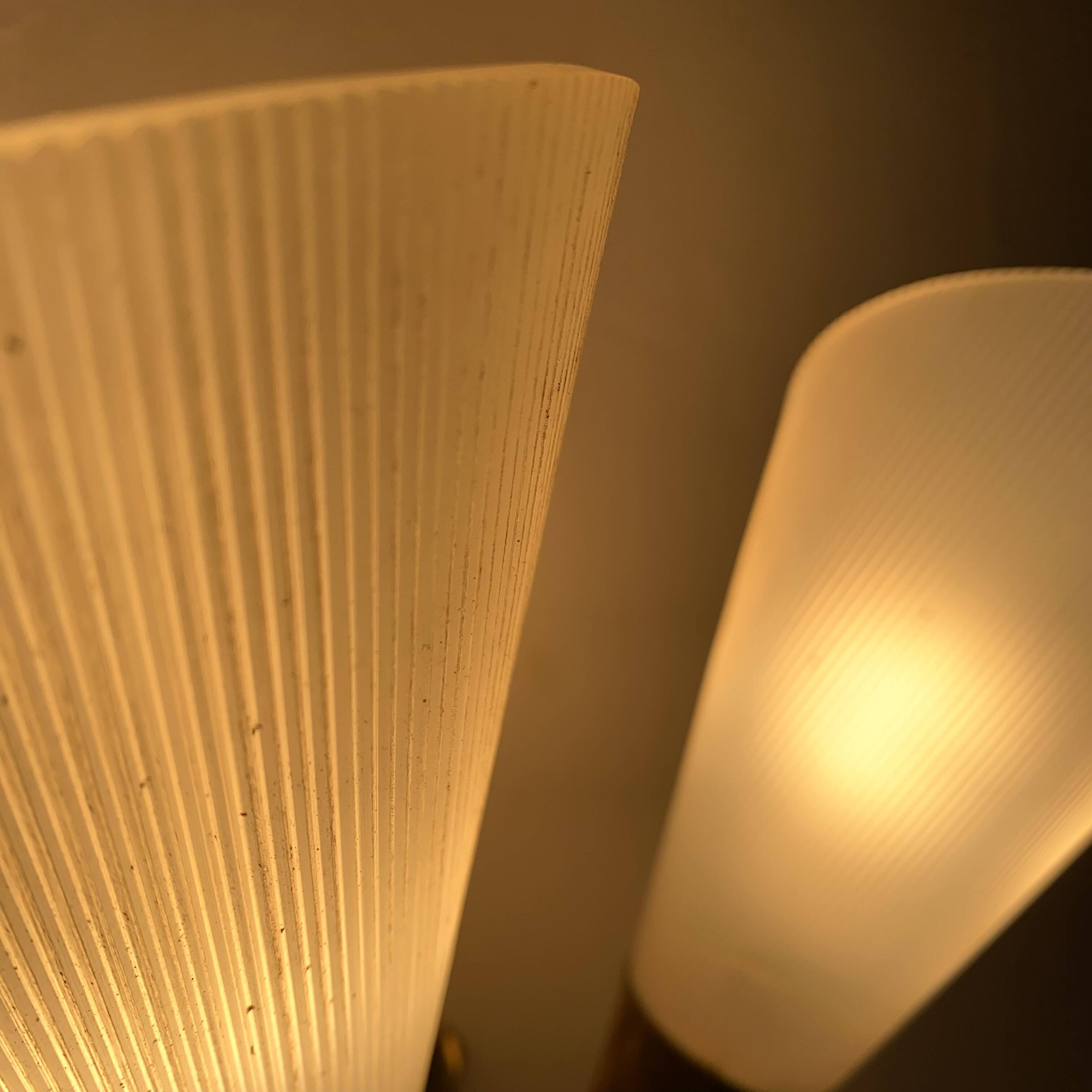 Adjustable conical wall lights from the 60s