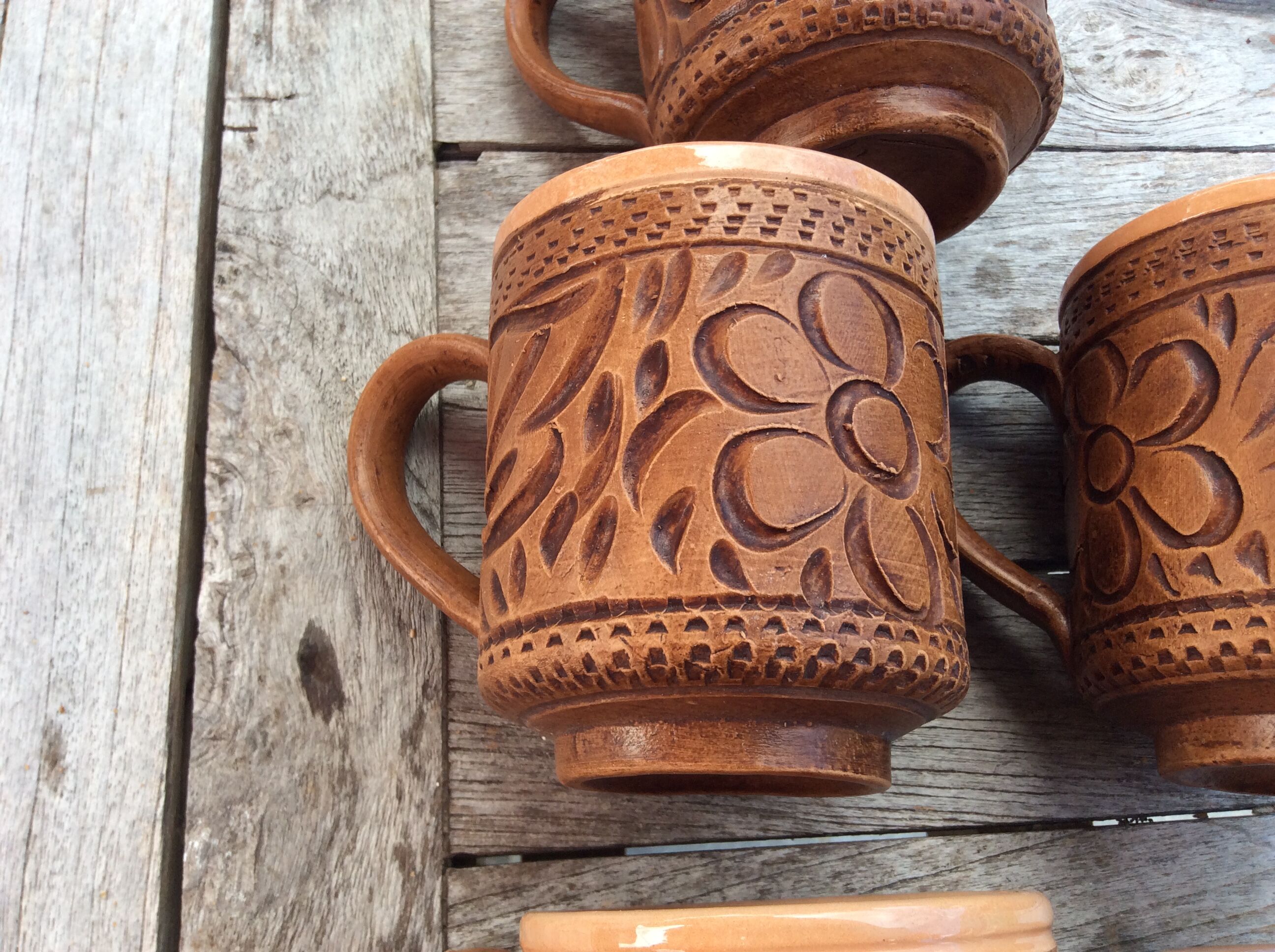 5 terracotta mugs