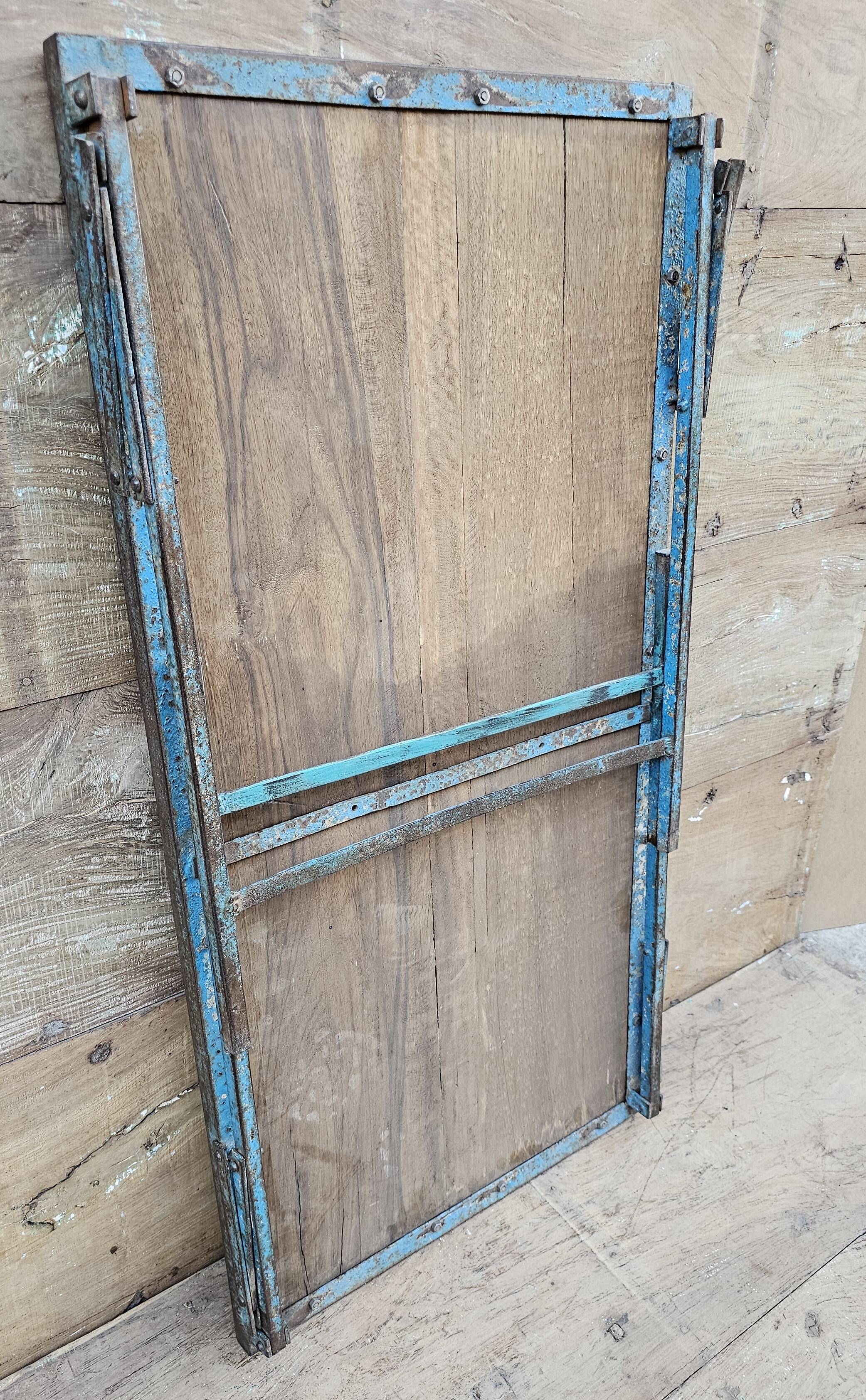 Old folding table in Burmese teak and steel
