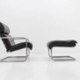 Ensemble fauteuil lounge et repose-pieds en cuir tubulaire chromé - années 1950