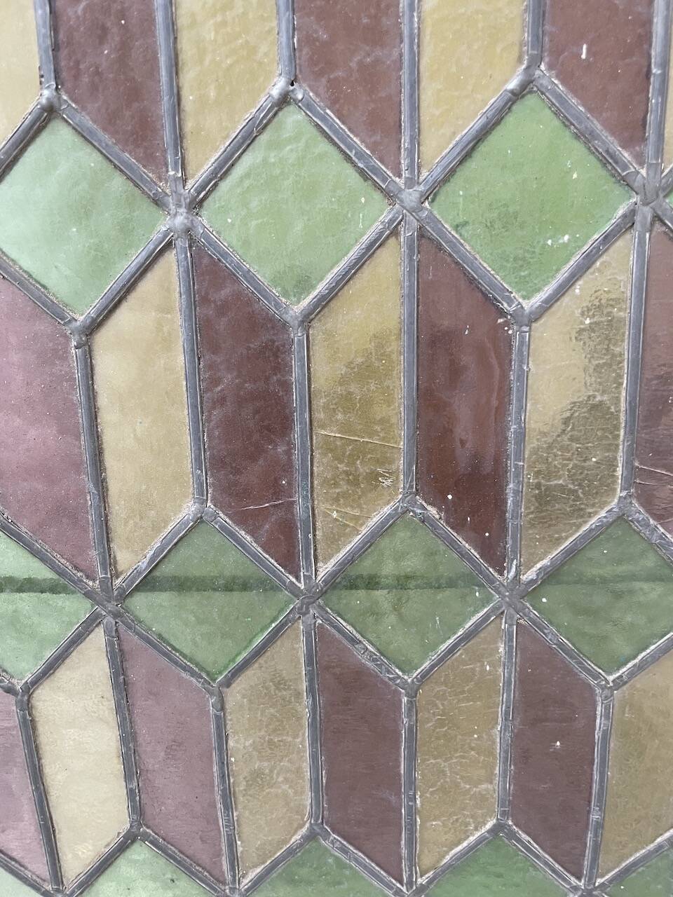 Old stained glass window in metal and glass 1900