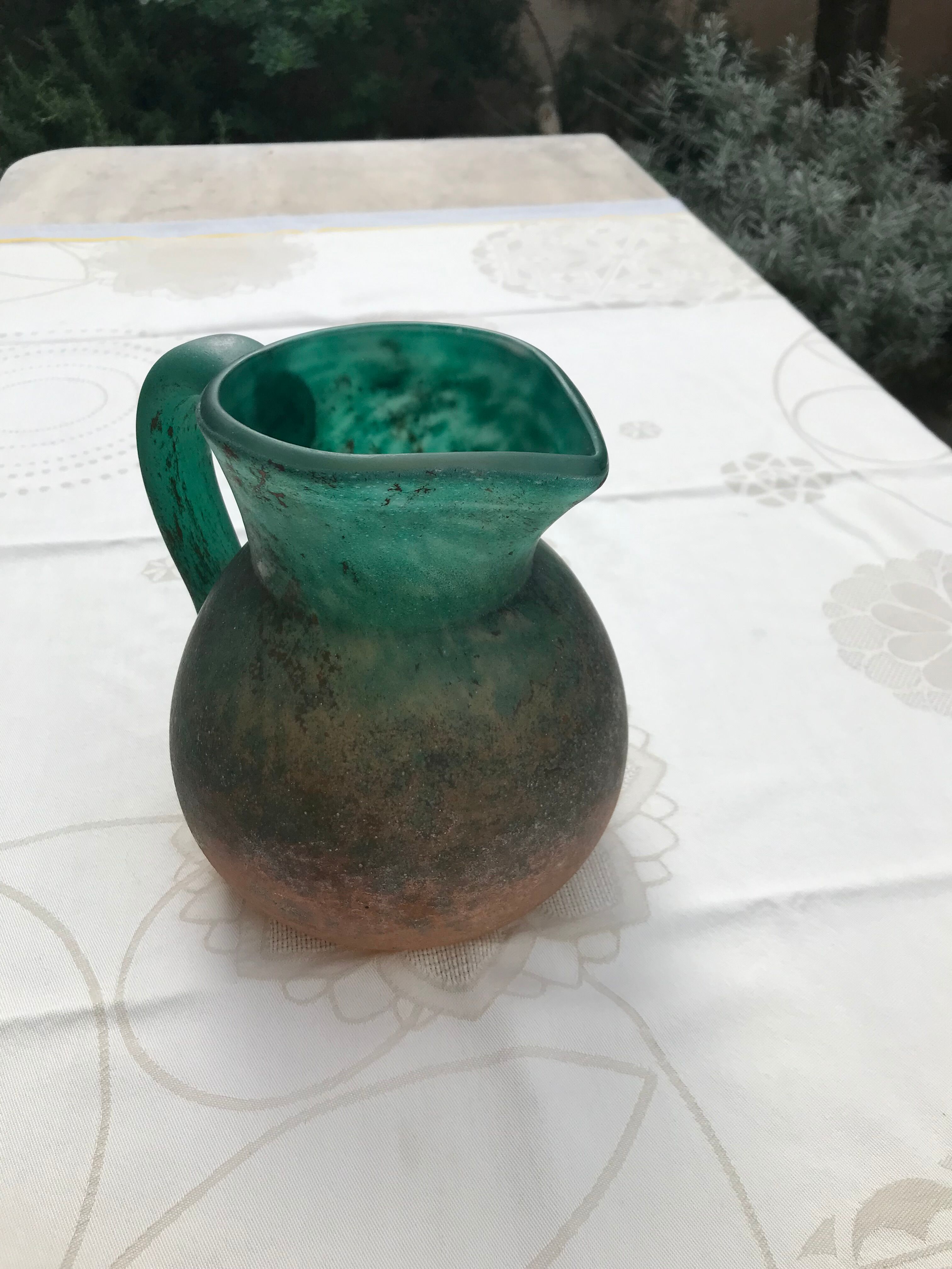 Orange and green glass paste pitcher by Georges DE FEURE