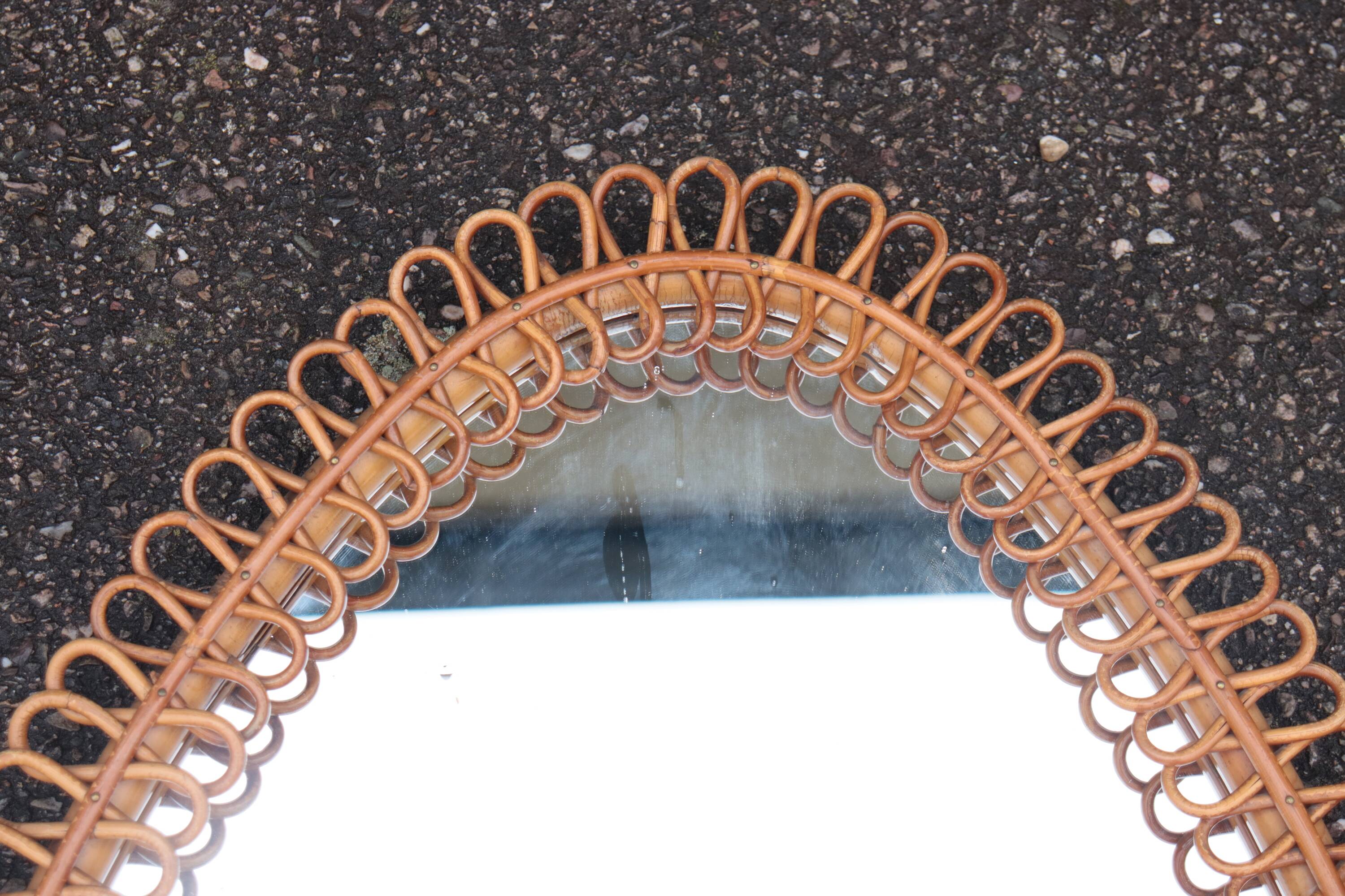 Large rattan mirror attributed to Franco Albini, Italy 1960.