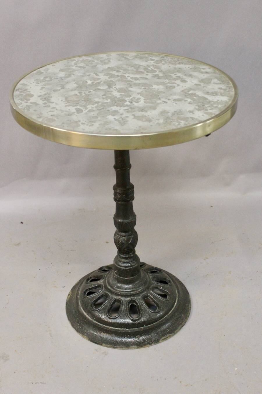 Bistro table with marble top and brass rim