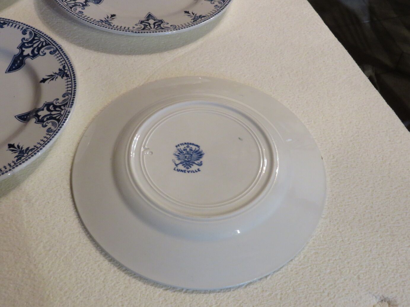 Suite 4 assiettes terre de fer Luneville