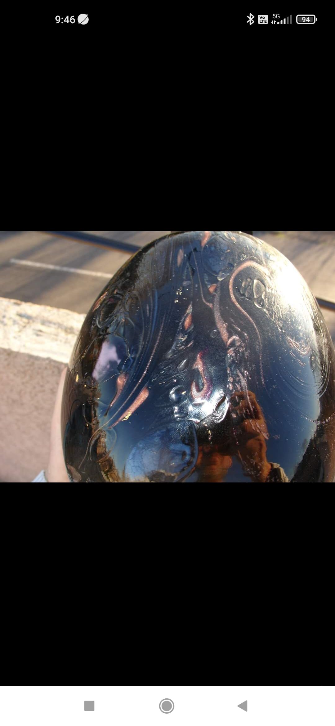 Vase in multi-layered black glass paste with inclusions of gold and other colors, signed by Bob le Bleïs