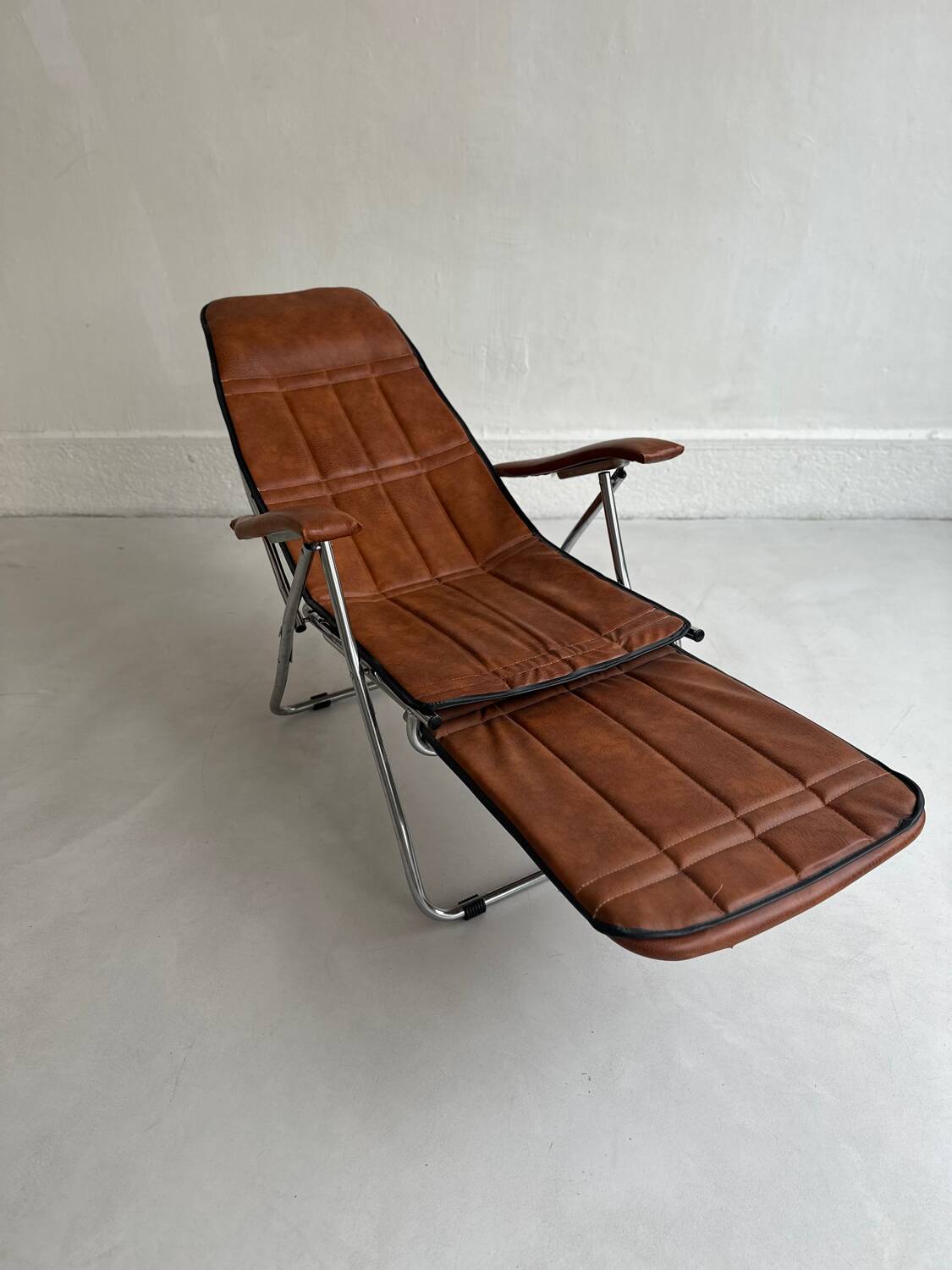 Authentic vintage reclining armchair