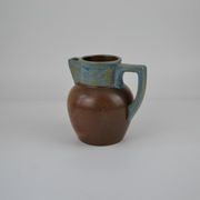 Two-tone stoneware pitcher by Louis Lourioux
