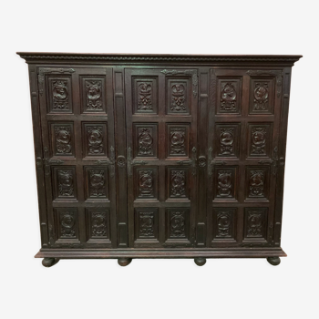 Storage cabinet has three doors Renaissance XX century style