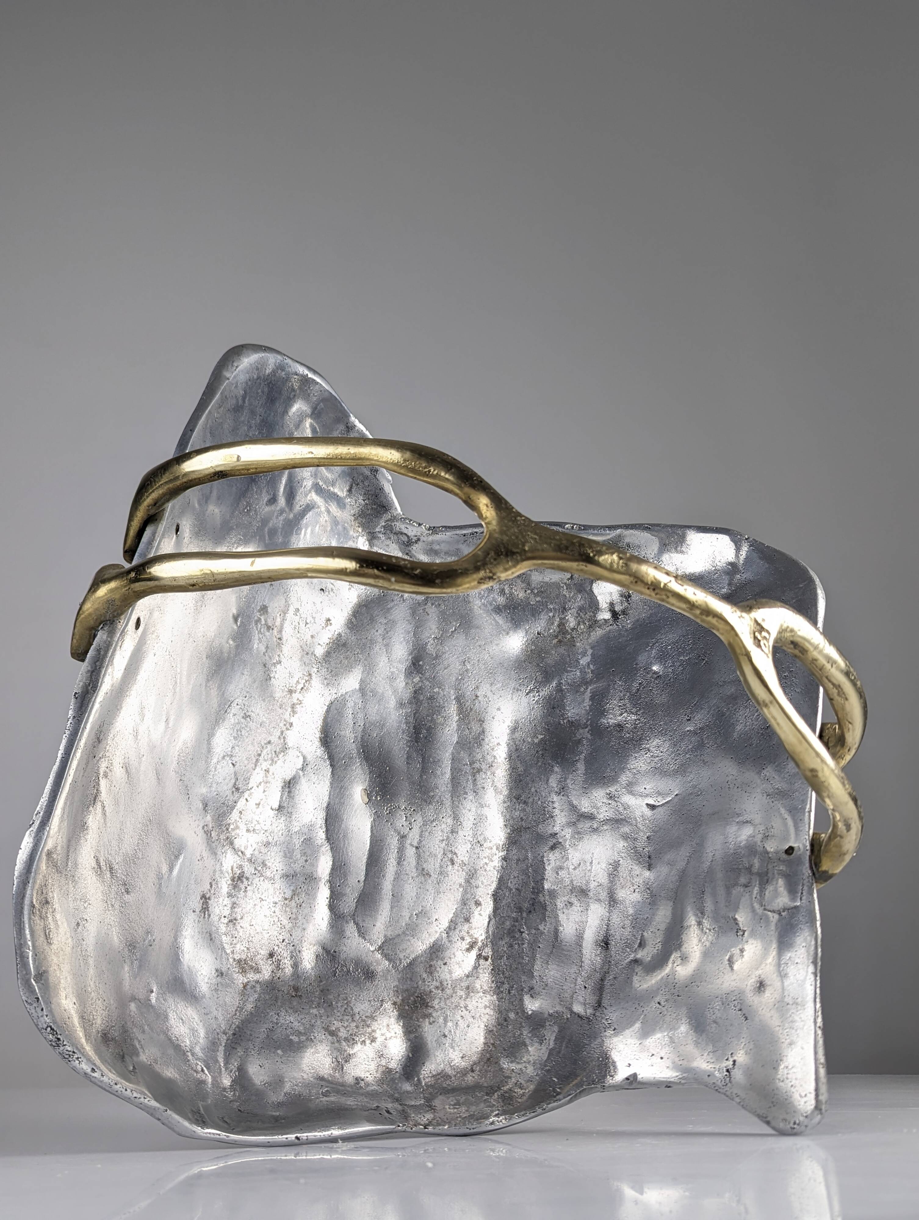 Firewood holder by David Marshall, 1980s