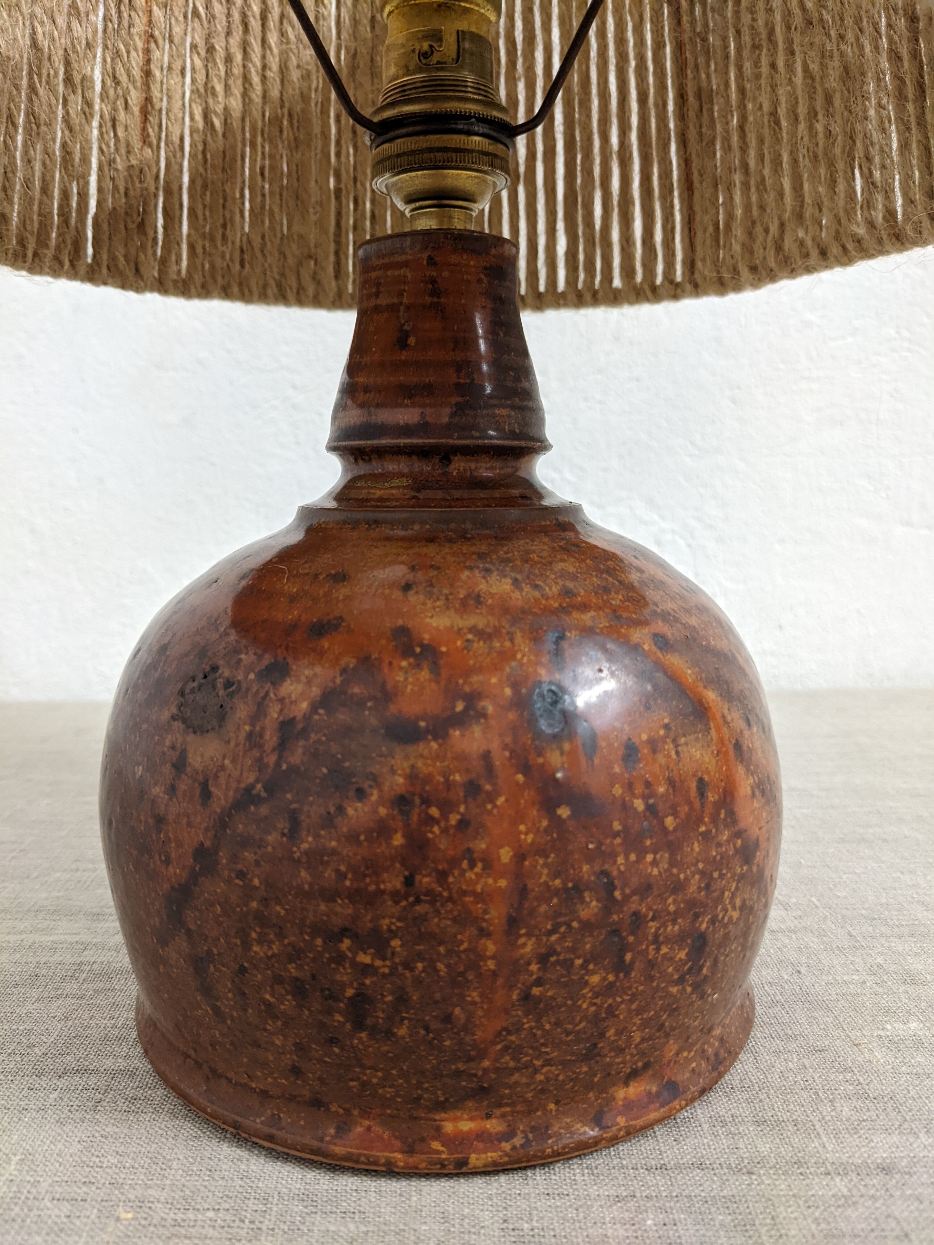 Vintage varnished stoneware lamp and jute rope