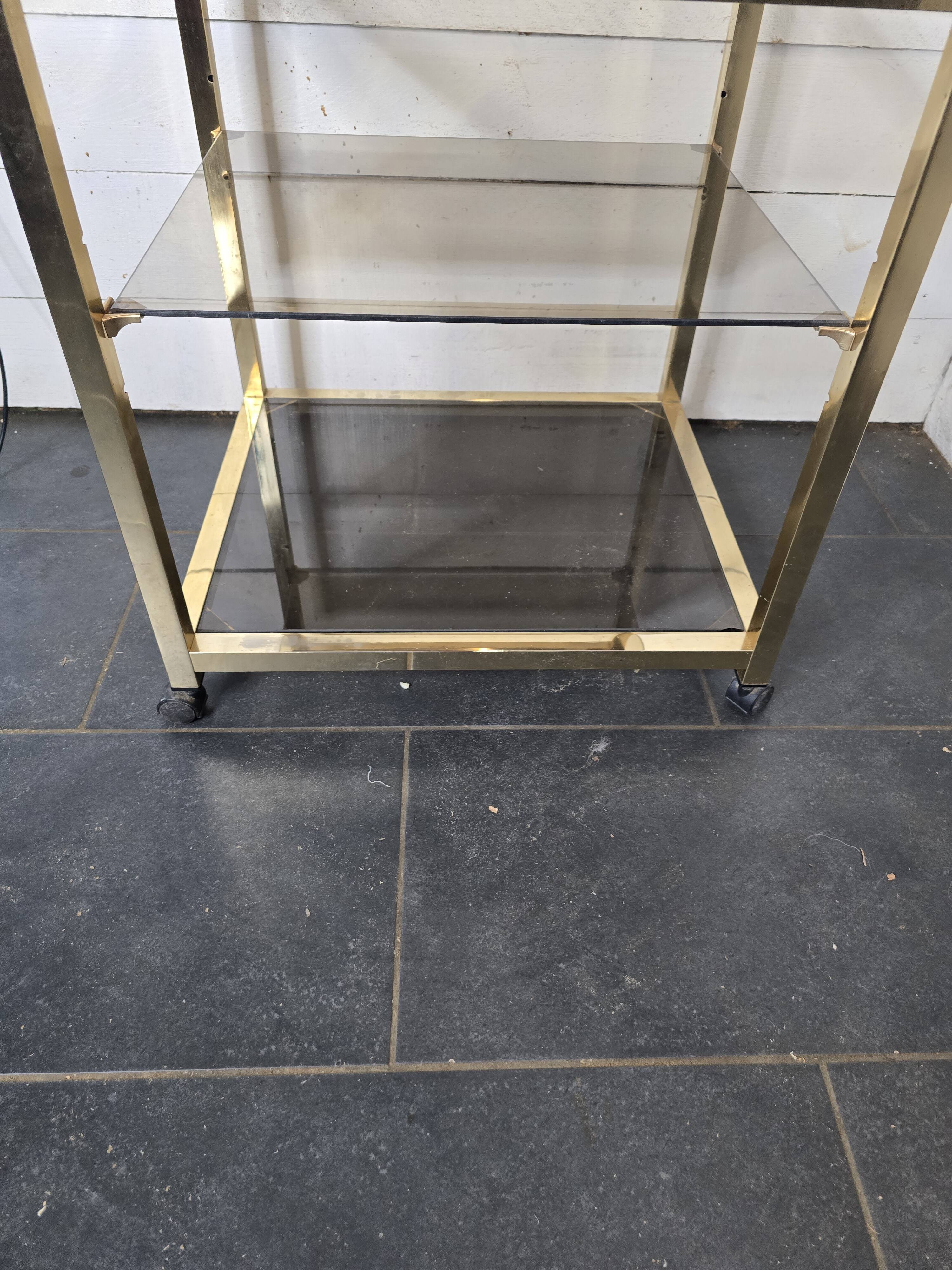 Brass and smoked glass side table from the 70s