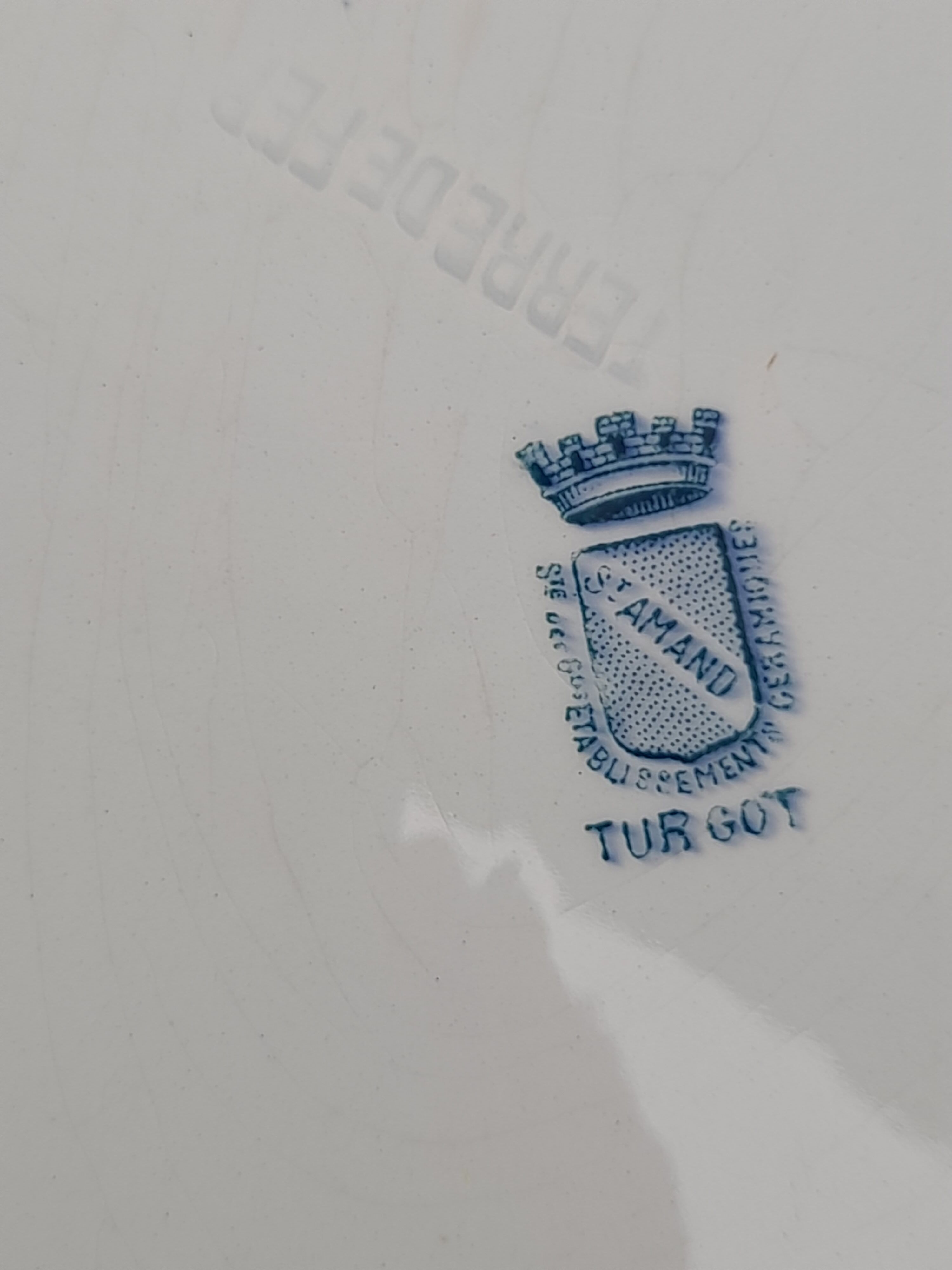 Oval dish in Earthenware of Saint Amand model turgot Iron Earth diam 35.5 cm