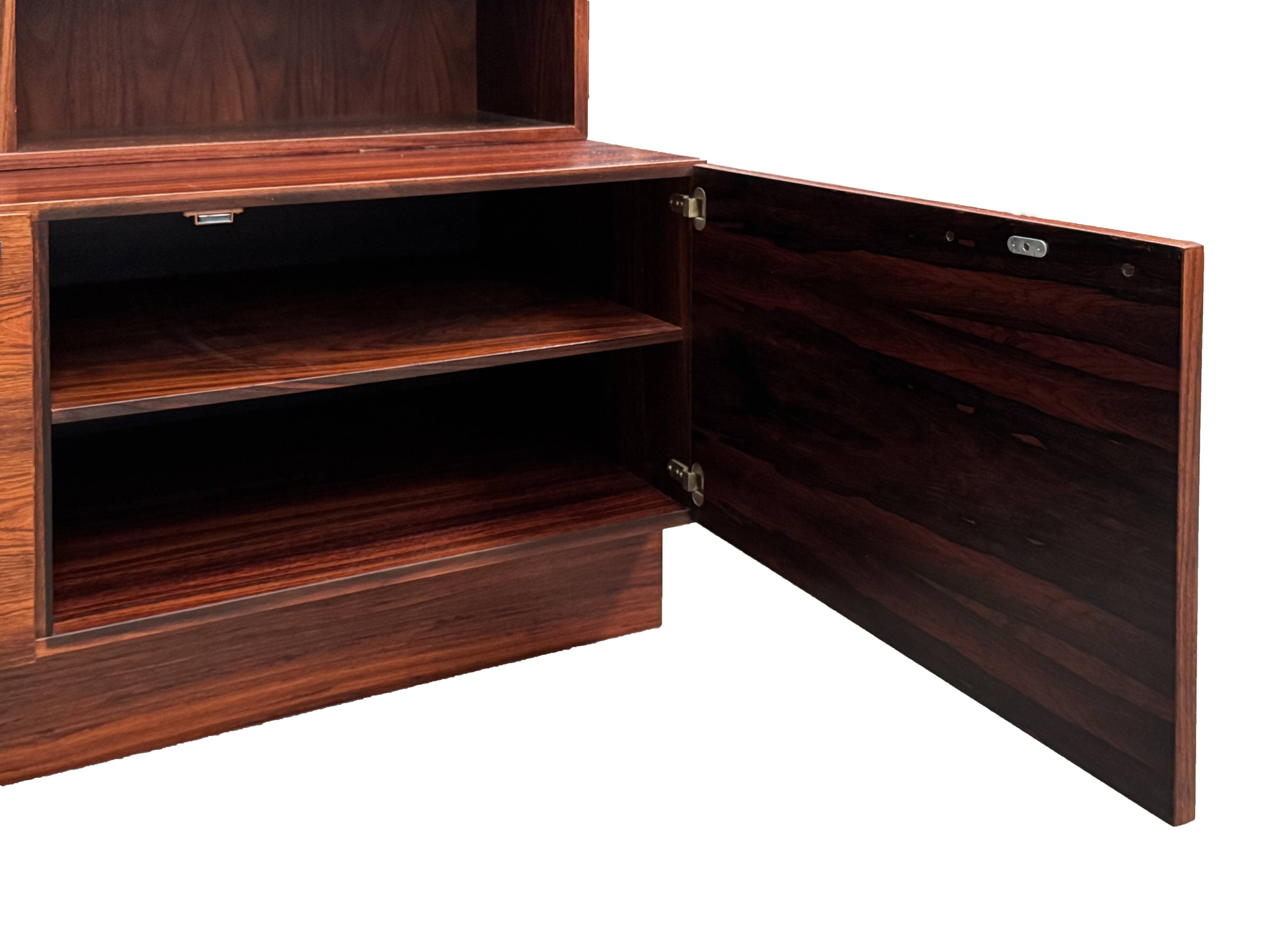 Scandinavian library in rosewood designed by Ib Kofod Larsen.