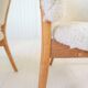 Mid-century lounge chairs in sheepskin/shearling and stained wood, Sweden, 1962.