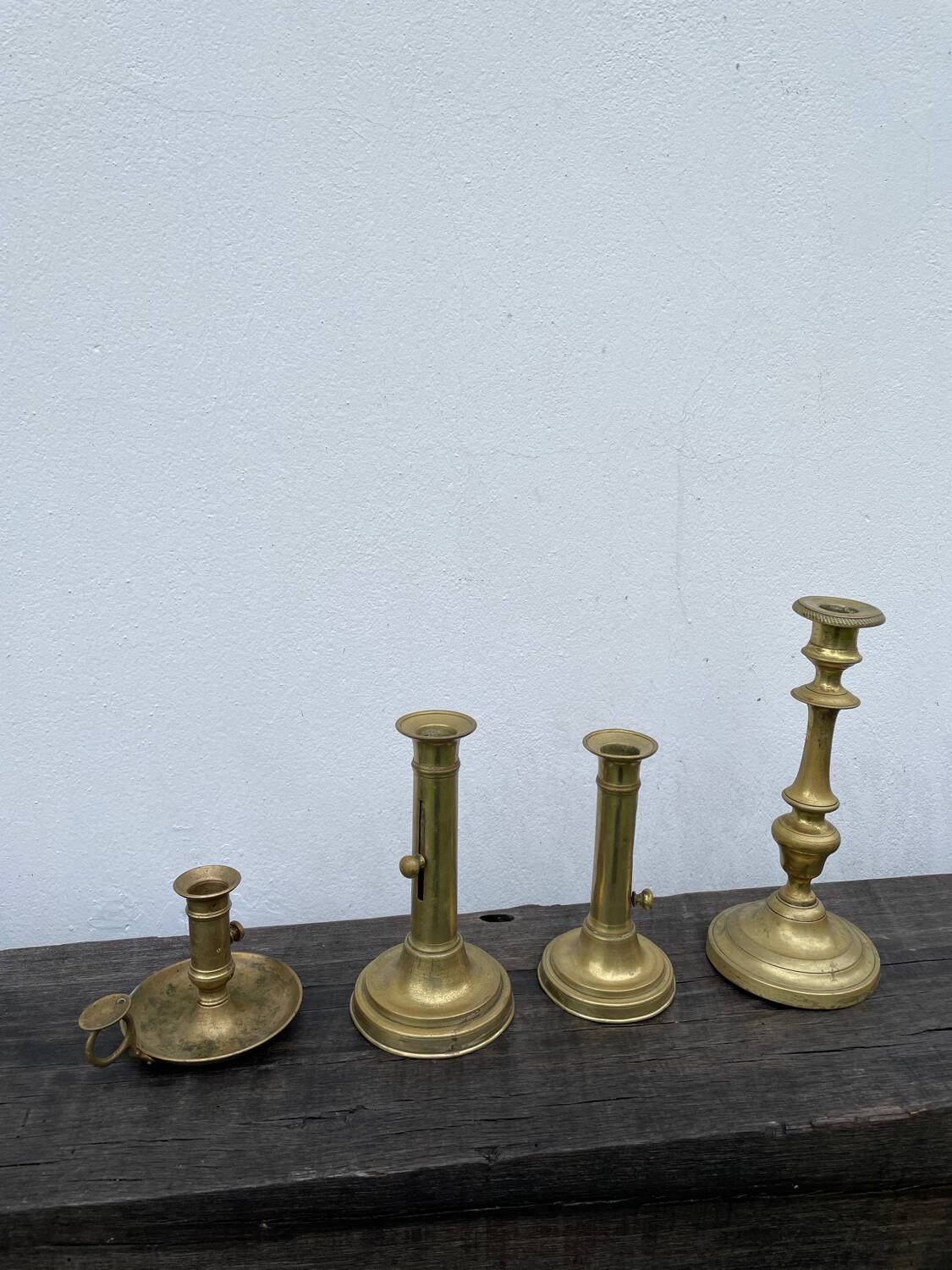 Set of gold-plated brass candlesticks