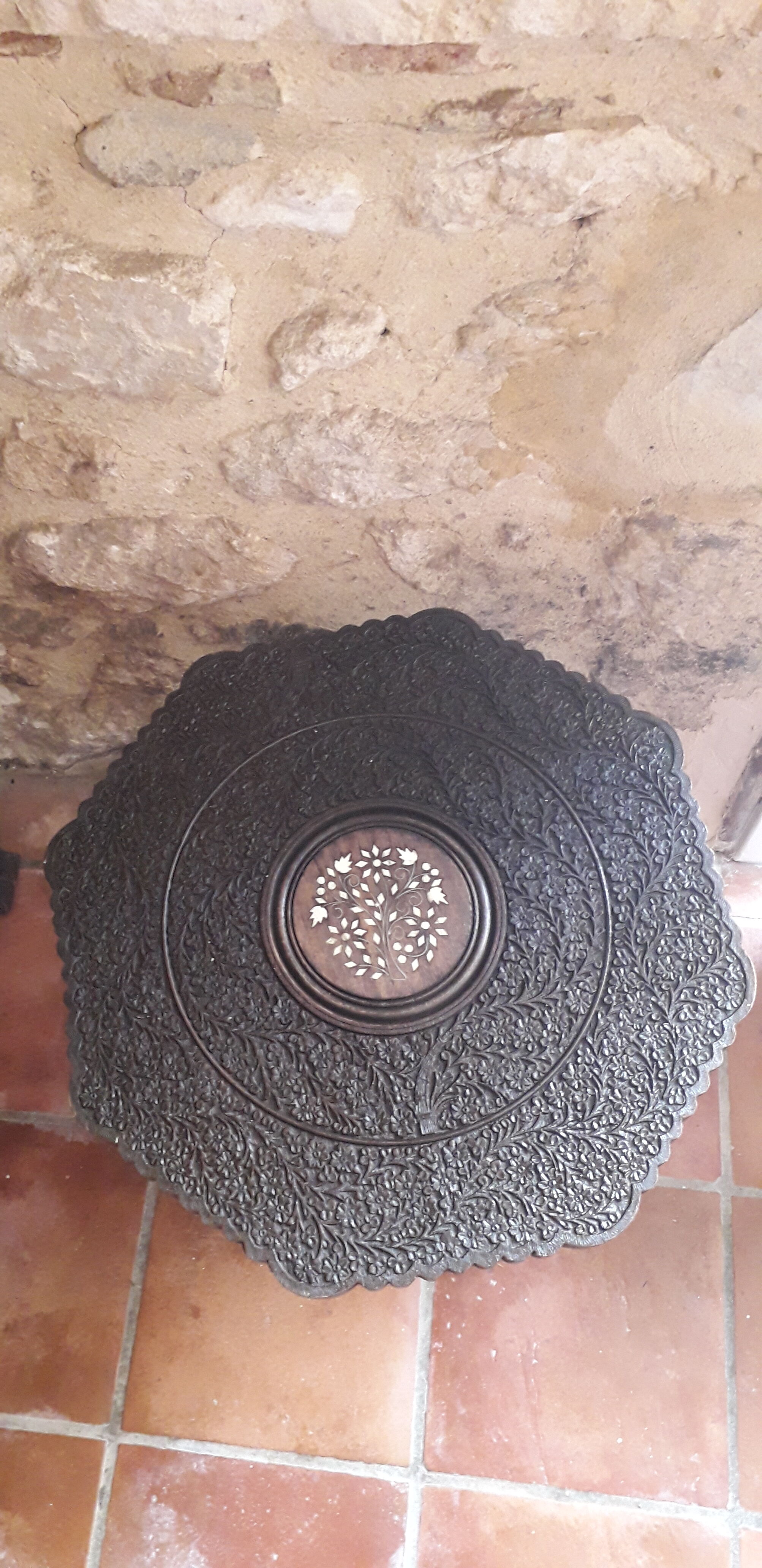 Old coffee table carved in teak wood