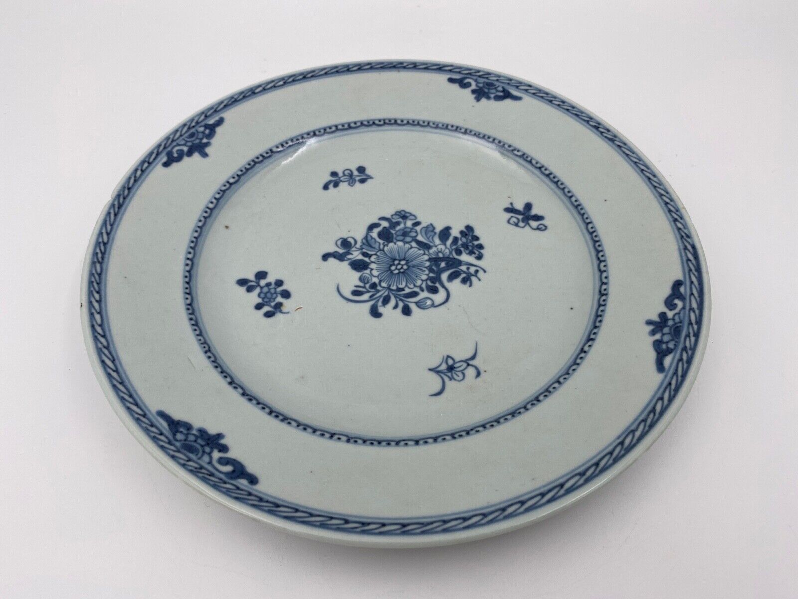 Plate in porcelain blue and white china xviii floral decoration