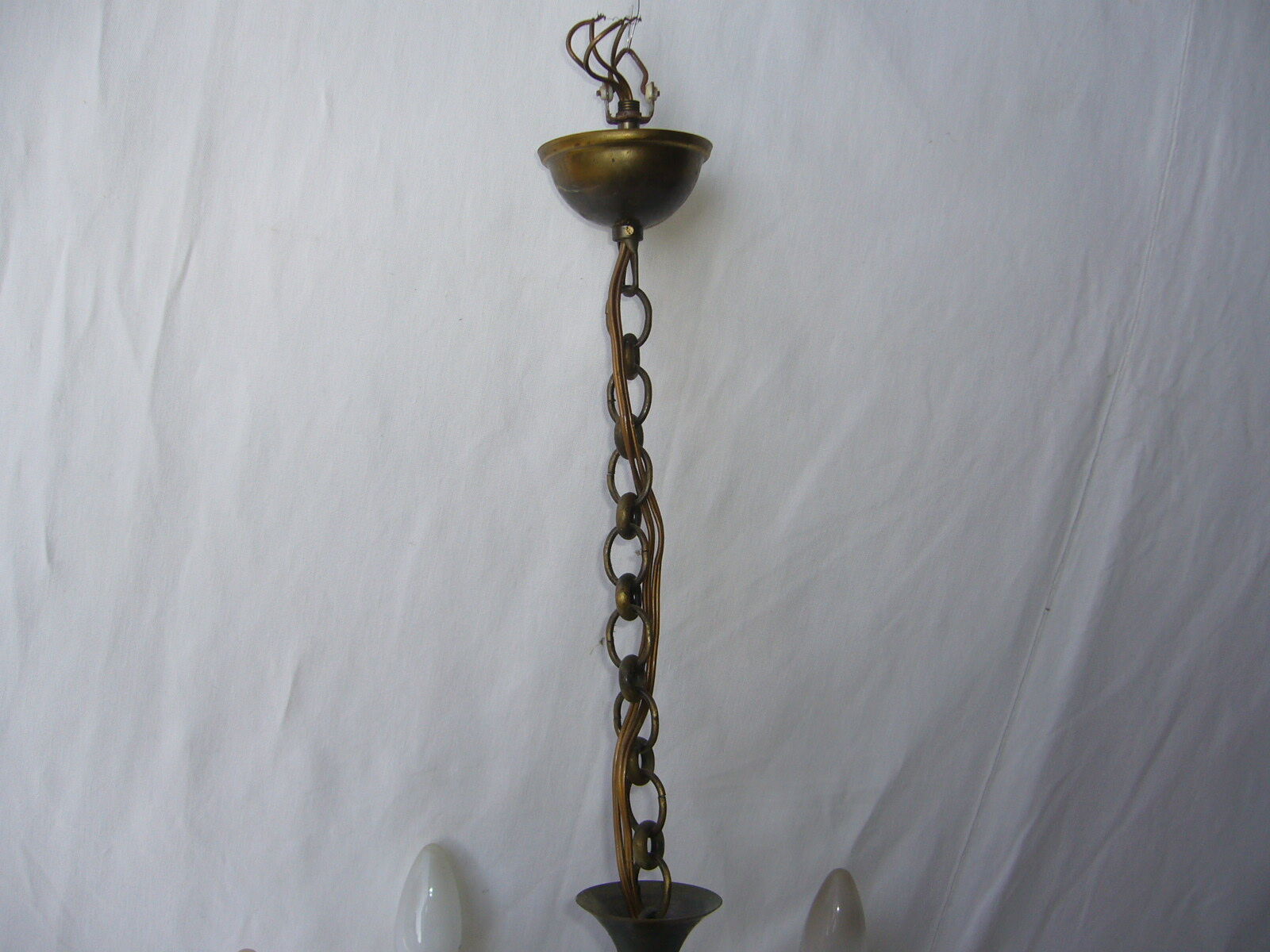 Brass chandelier and Dutch-style earthenware. Vintage
