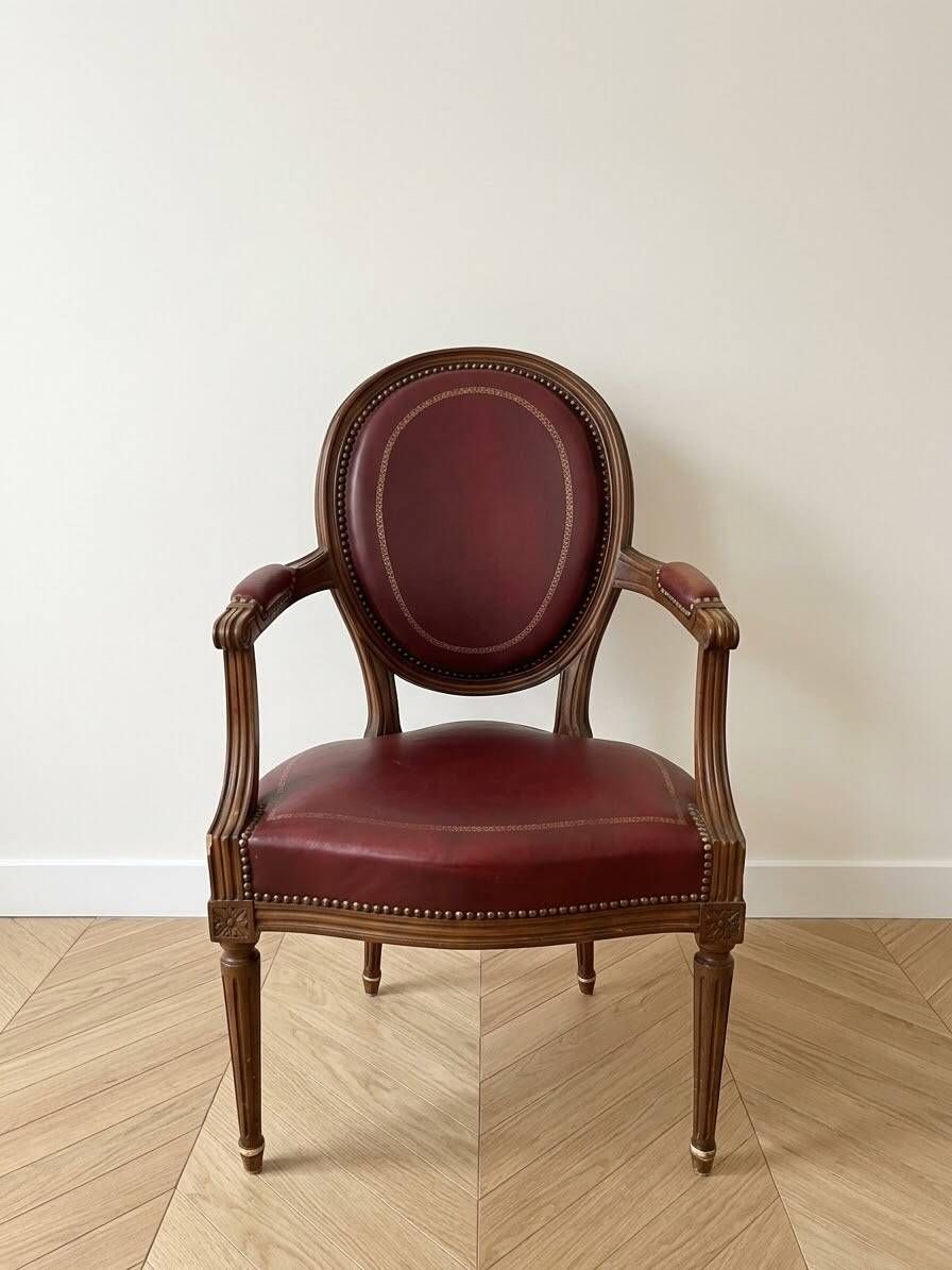 Set of 6 Louis XVI style medallion chairs and armchairs in burgundy leather.