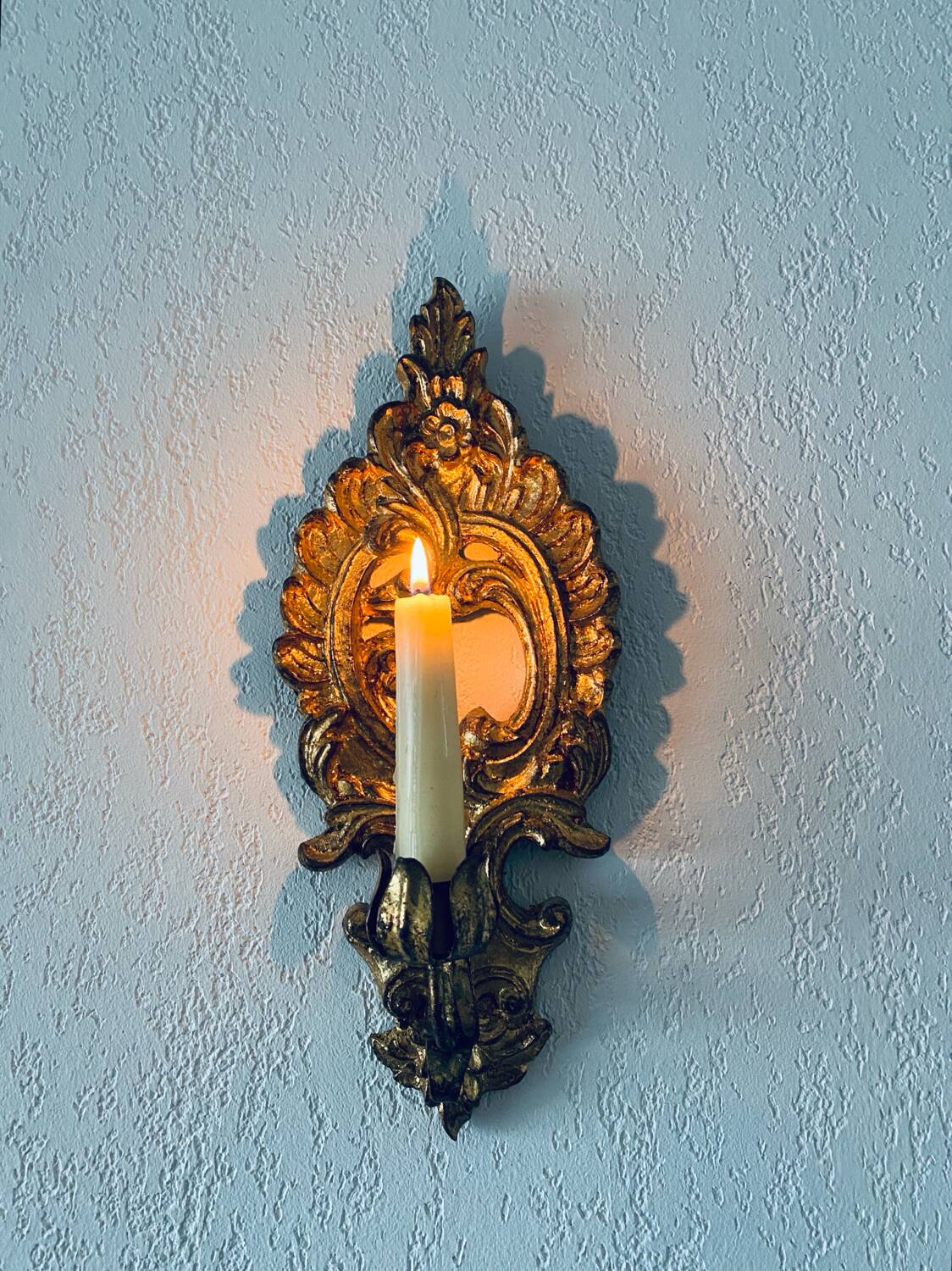 Gold wall candle holder