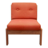 1970s chair in oak and orange cushions