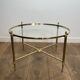 Neoclassical Round Coffee Table in Brass with Fluted Supports and Floral Motifs