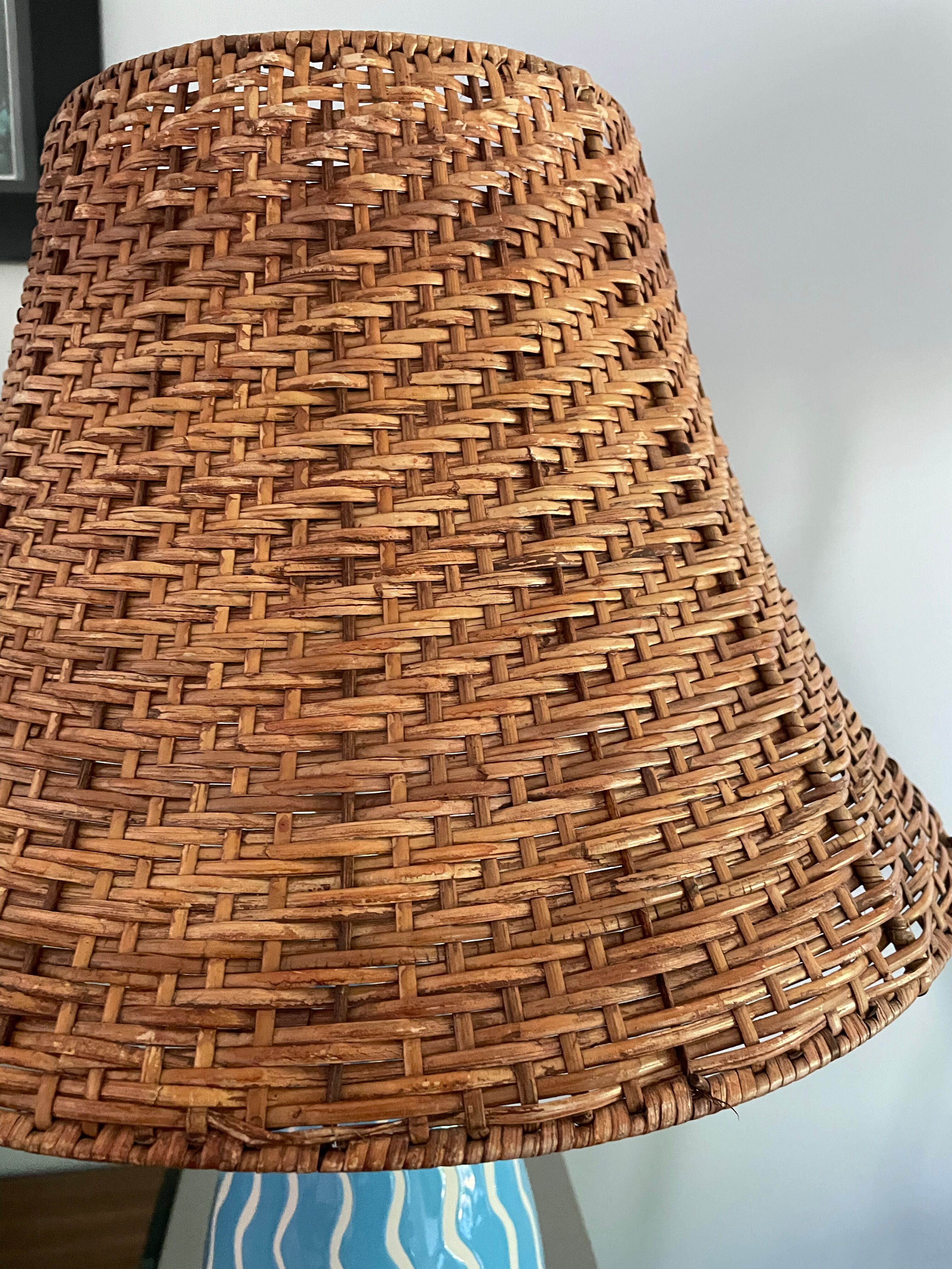Blue ceramic lamp and rattan