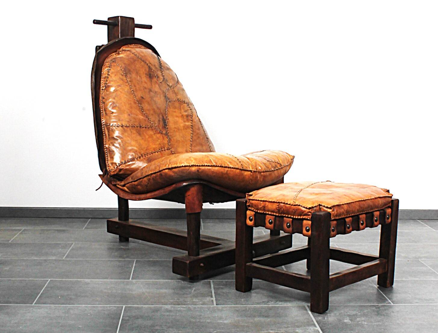 Brutalist oak lounge chair and ottoman, 1970s, set of 2