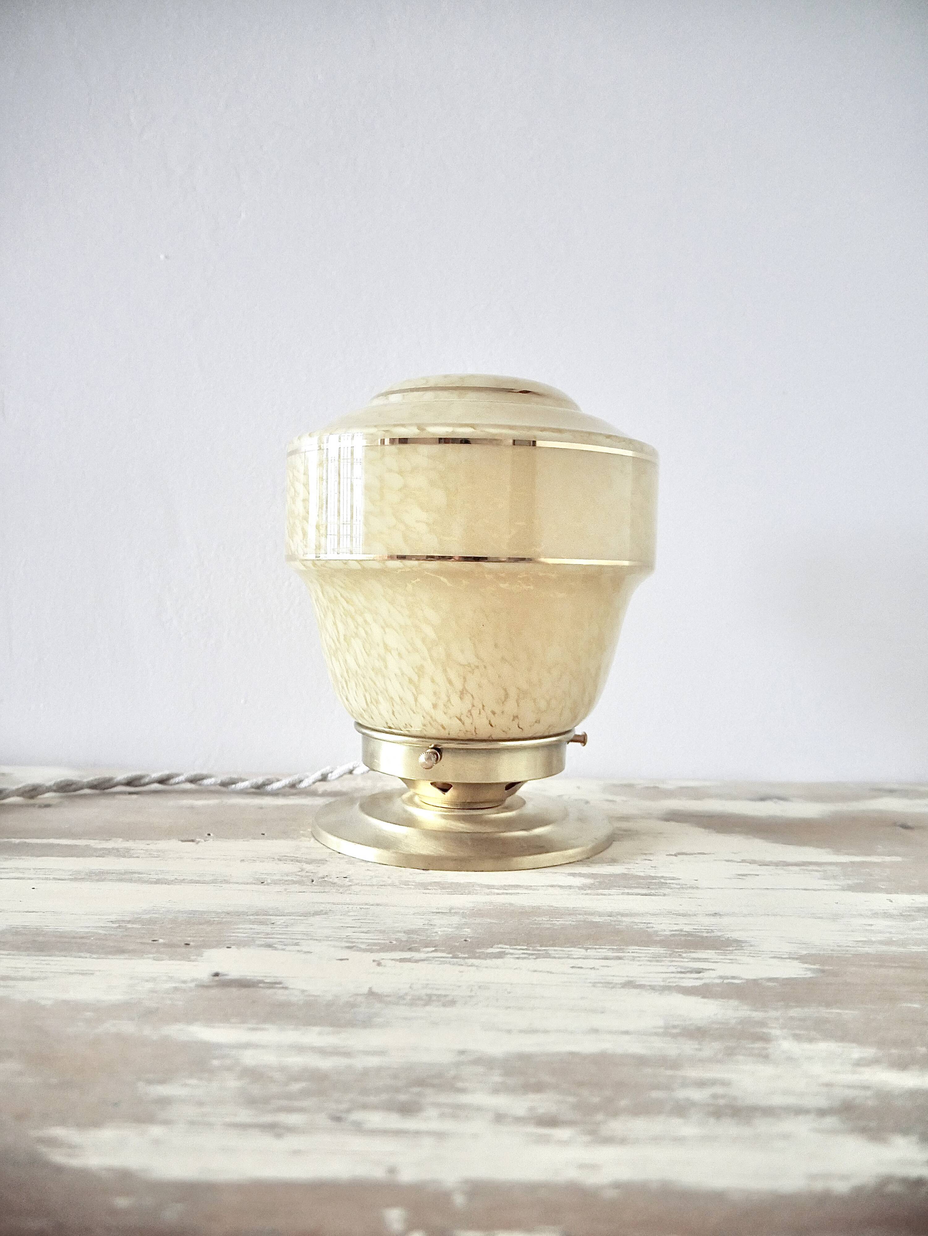 Clichy glass table lamp with a golden trim